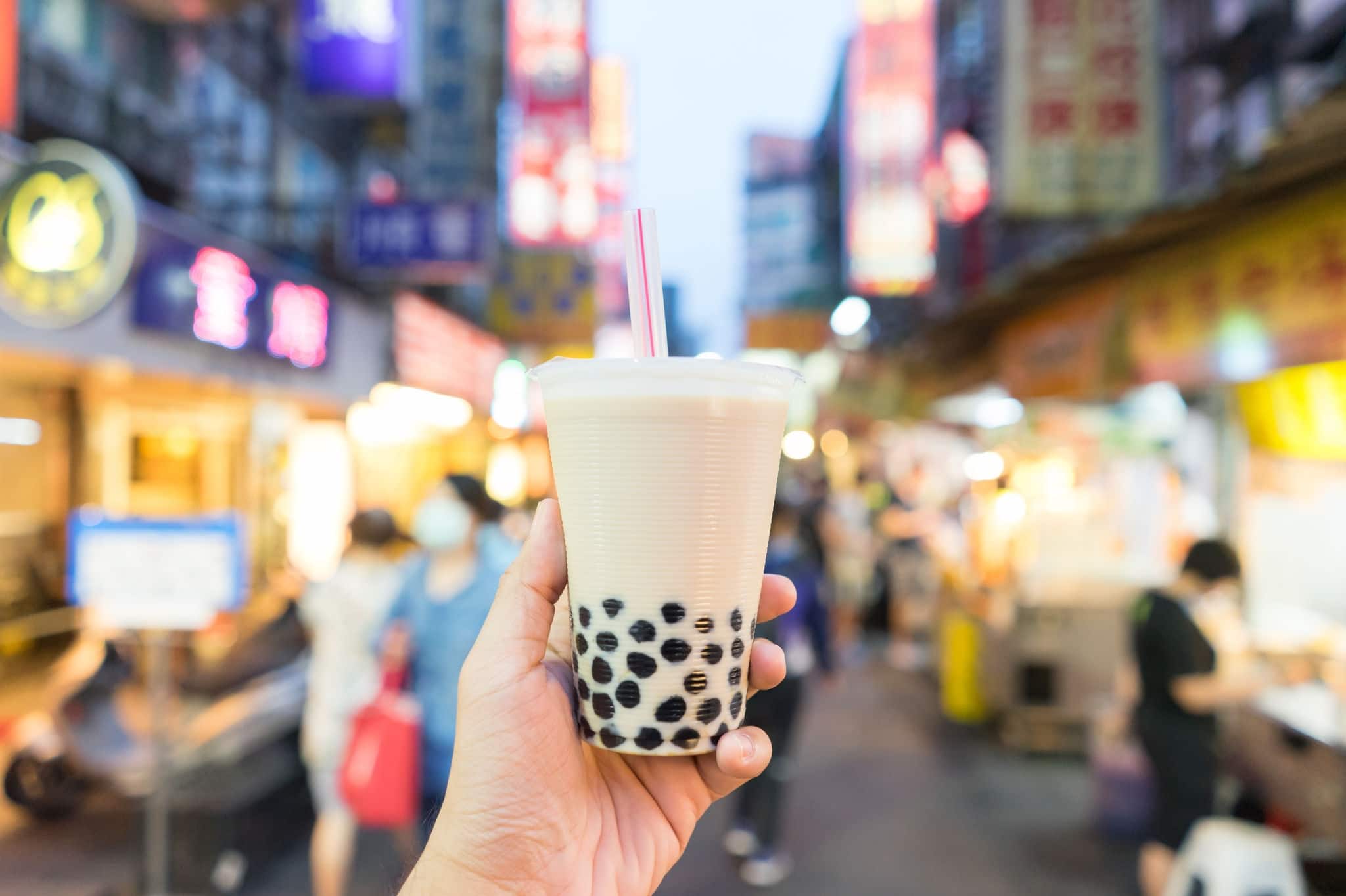 Boba Bubble Tea the traditional drink of Taiwan tea. shot at the street food market at night.