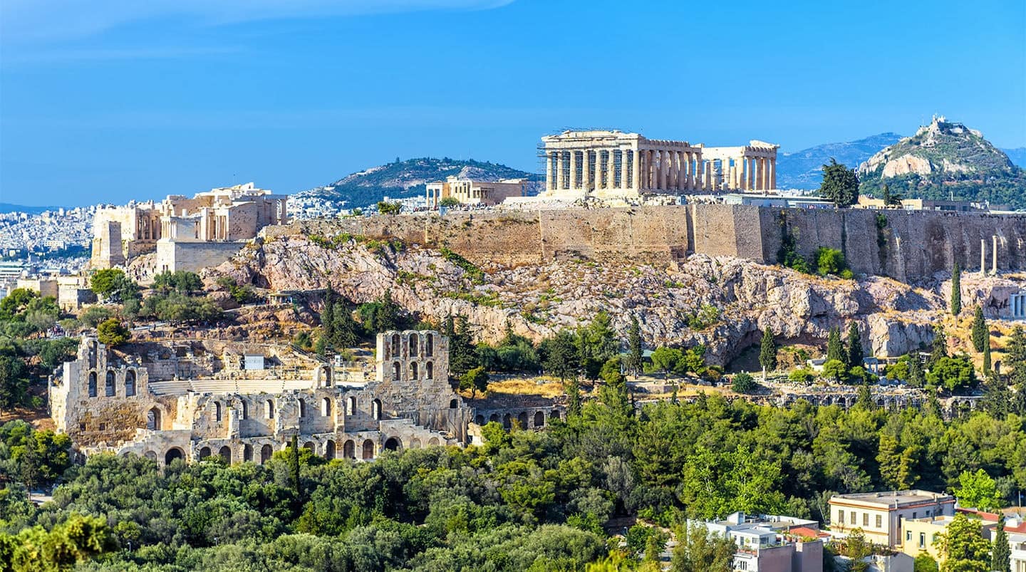Athens in summer, Greece. Panorama of Acropolis hill. It is a top landmark of Athens. Scenic view of Ancient Greek ruins. Nice landscape of old Athens city with famous Parthenon. Skyline of Athens.