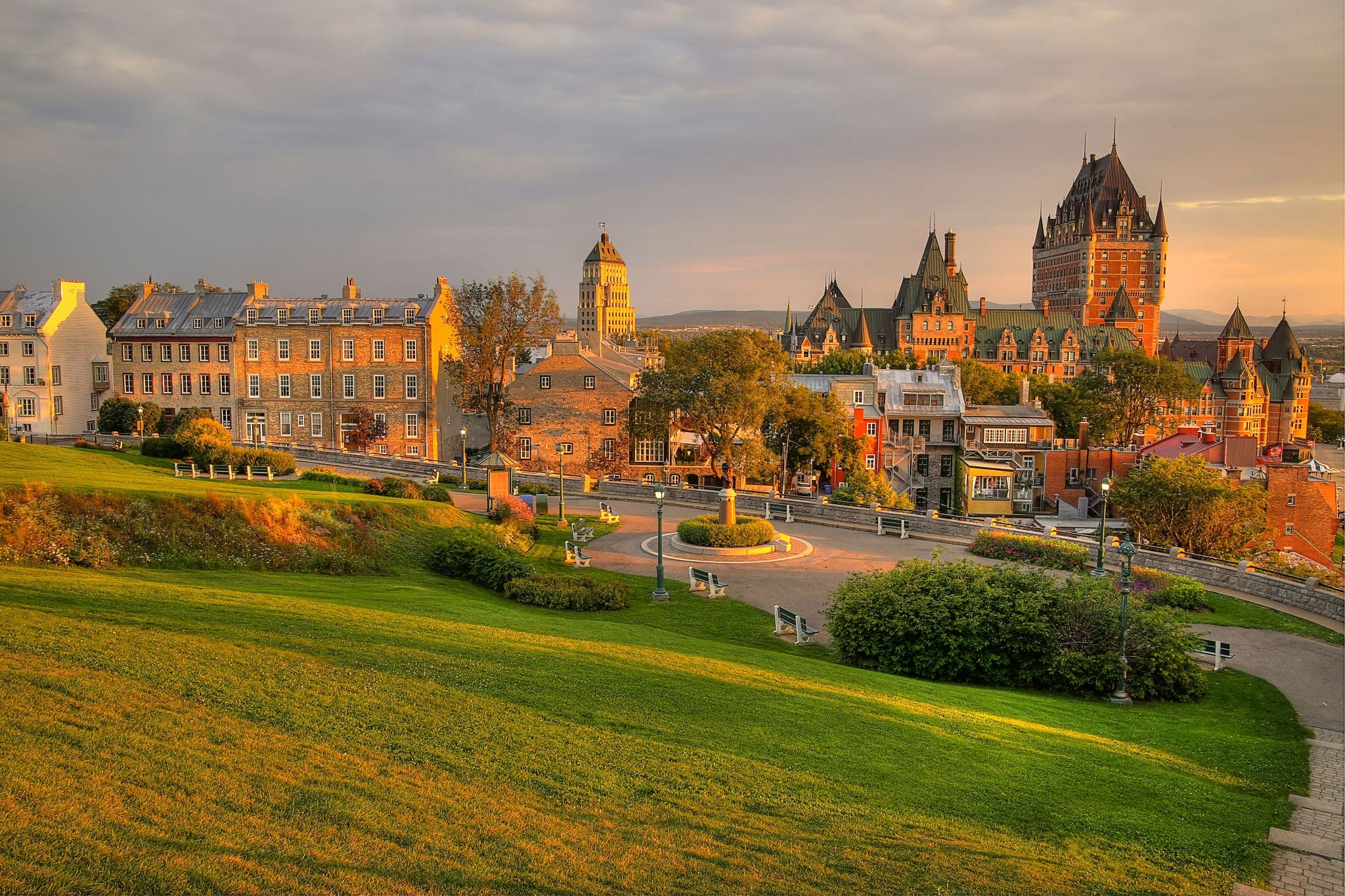 Frontenac Castle in Old Quebec City in the beautiful sunrise light. High dynamic range image. Travel, vacation, history, cityscape, nature, summer, hotels and architecture concept