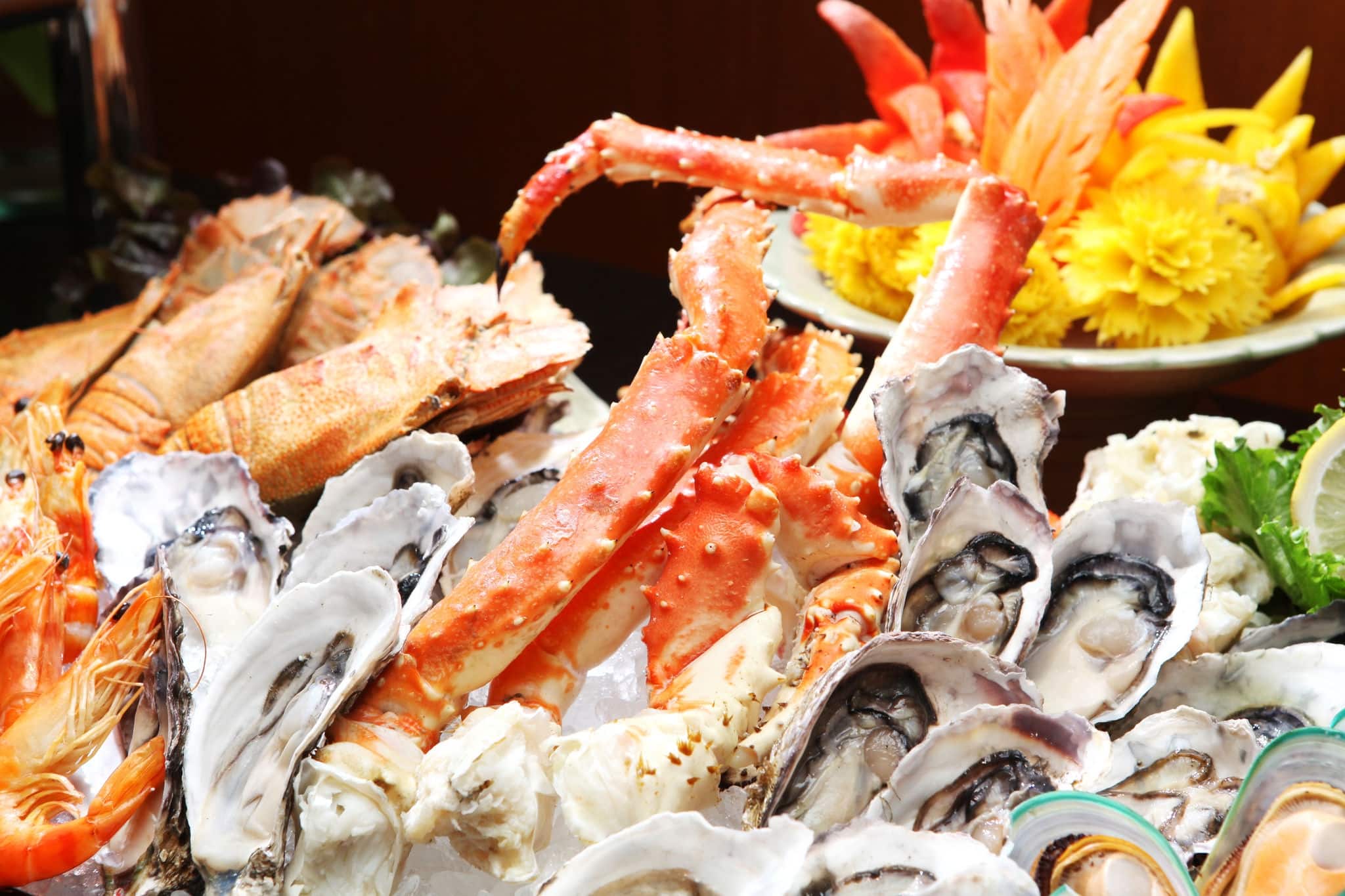 Oyster and Alaska King Crab, Seafood buffet line in hotel restaurant 