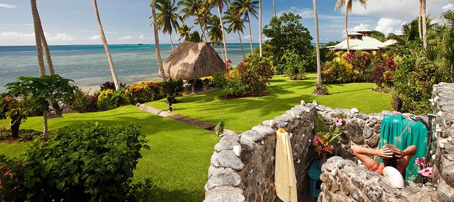 Beachfront resort with outdoor shower.
