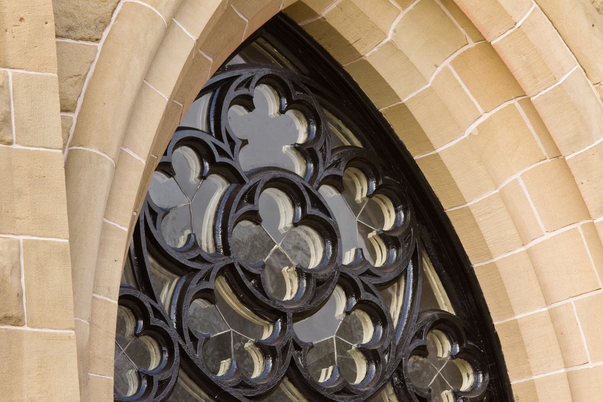 Architectural Details of Gothic style arched window. Saint Dunstans Basilica, Charlottetown, Prince Edward Island, Canada
