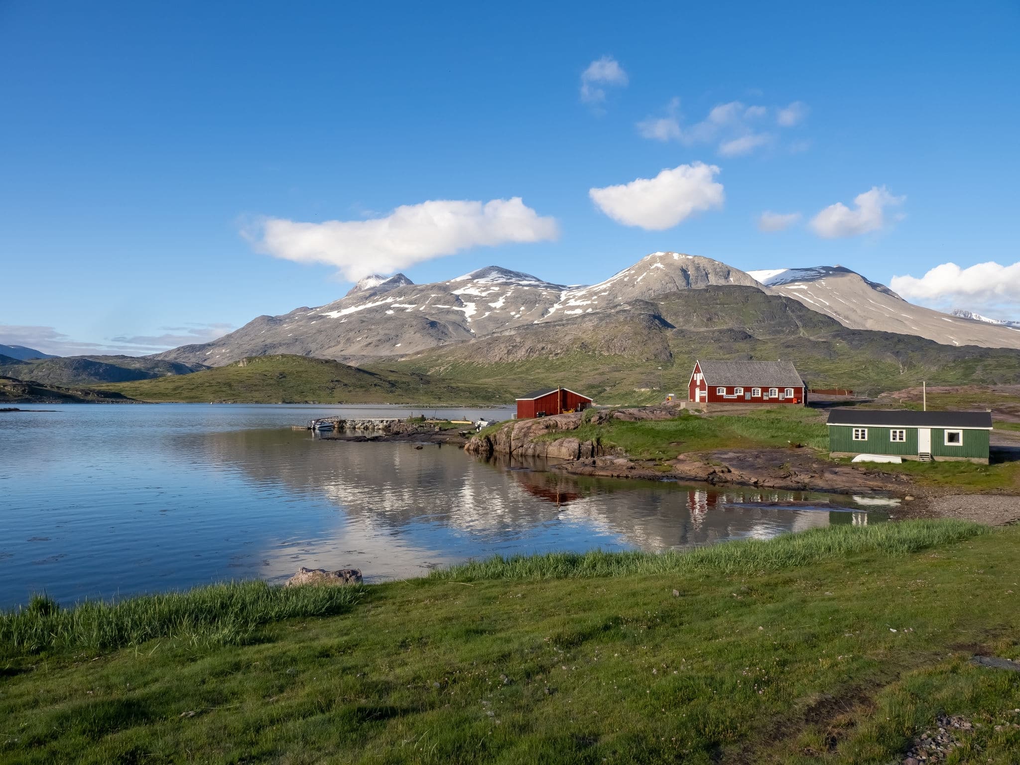 View of Igaliku in southern Greenland. A settlement with just a few dozen inhabitants. Famous for its Norse ruins of Garðar and its unique farming sites at the edge of the ice cap.