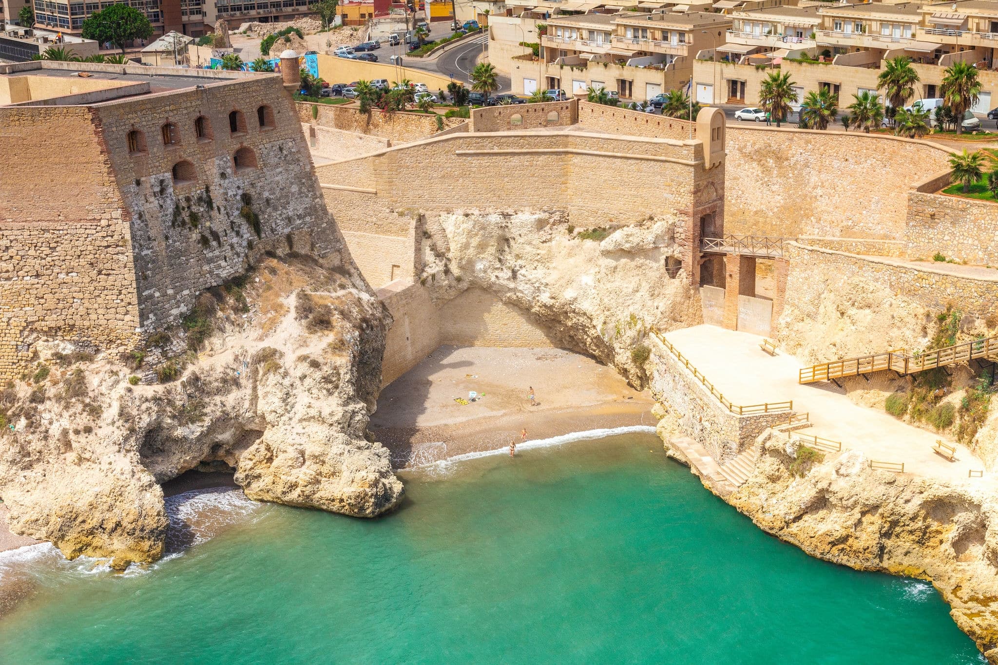 City walls with beach in Melilla, Spanish province in Morocco.
