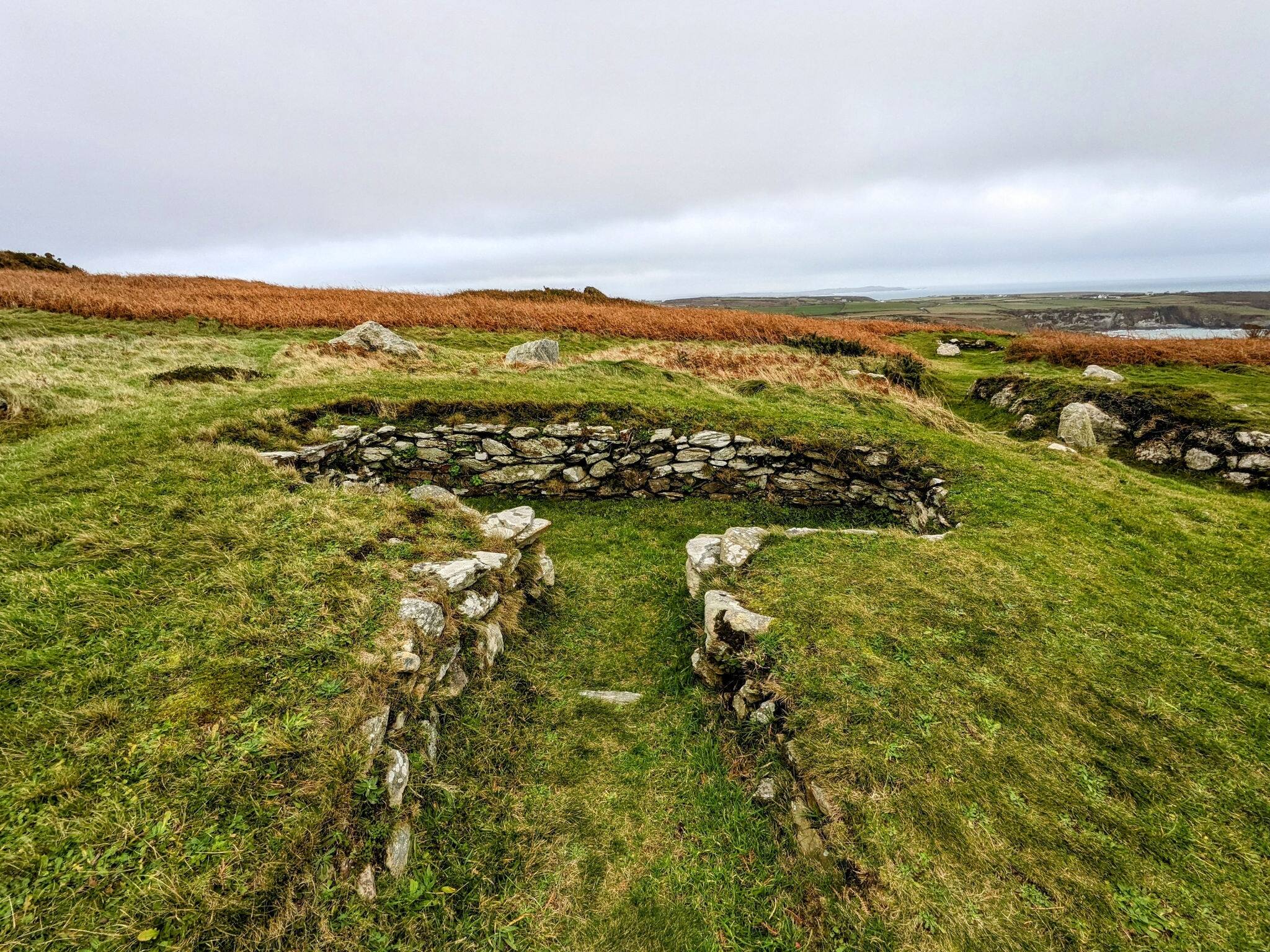 Tŷ Mawr Hut Circles in Holyhead, Anglesea, North Wales. Ancient circular huts preserved in time.