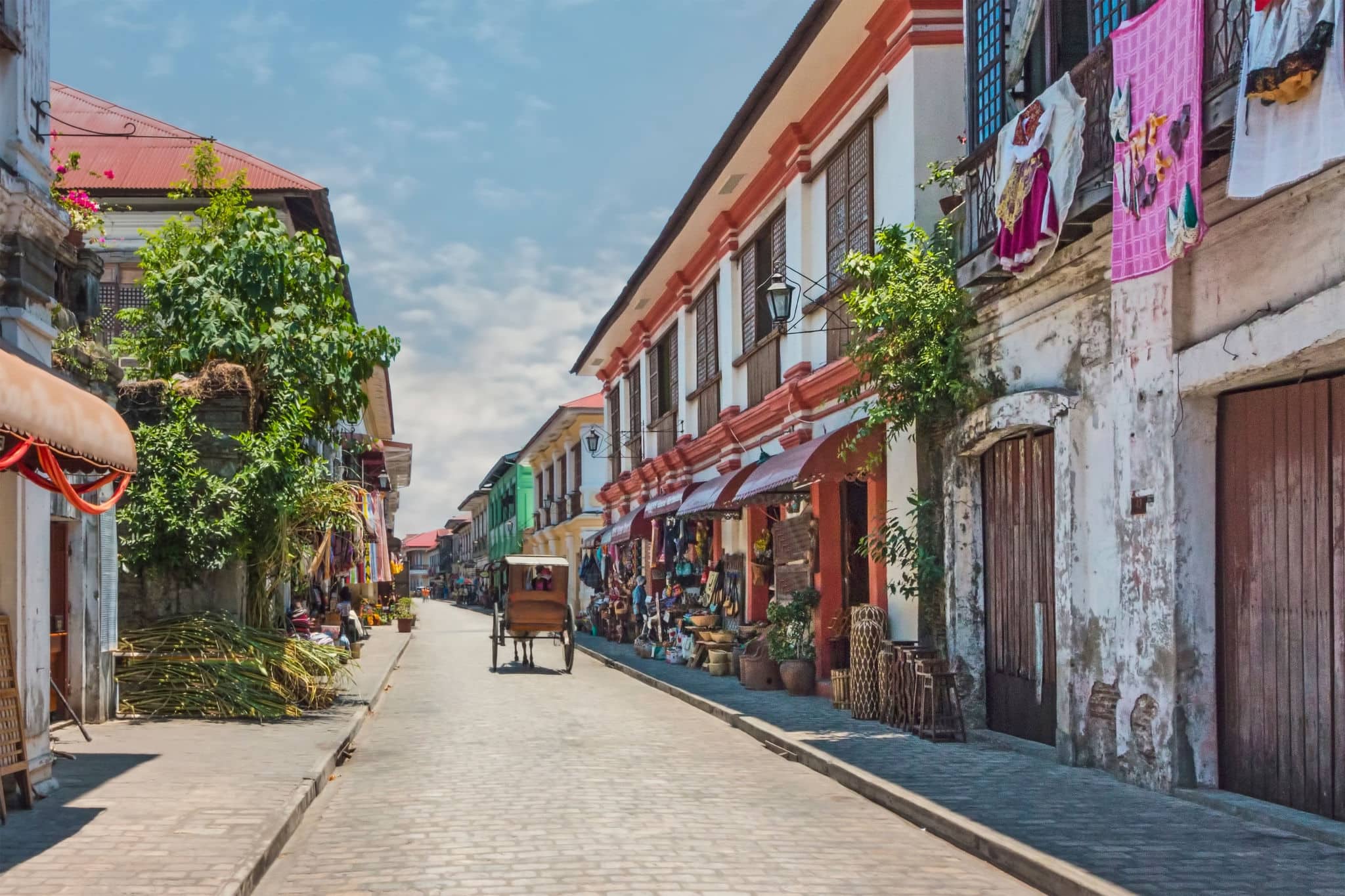 City Center Street Scene in Historic Colonial Town With Horse and Carriage (Vigan, Luzon, Philippines).