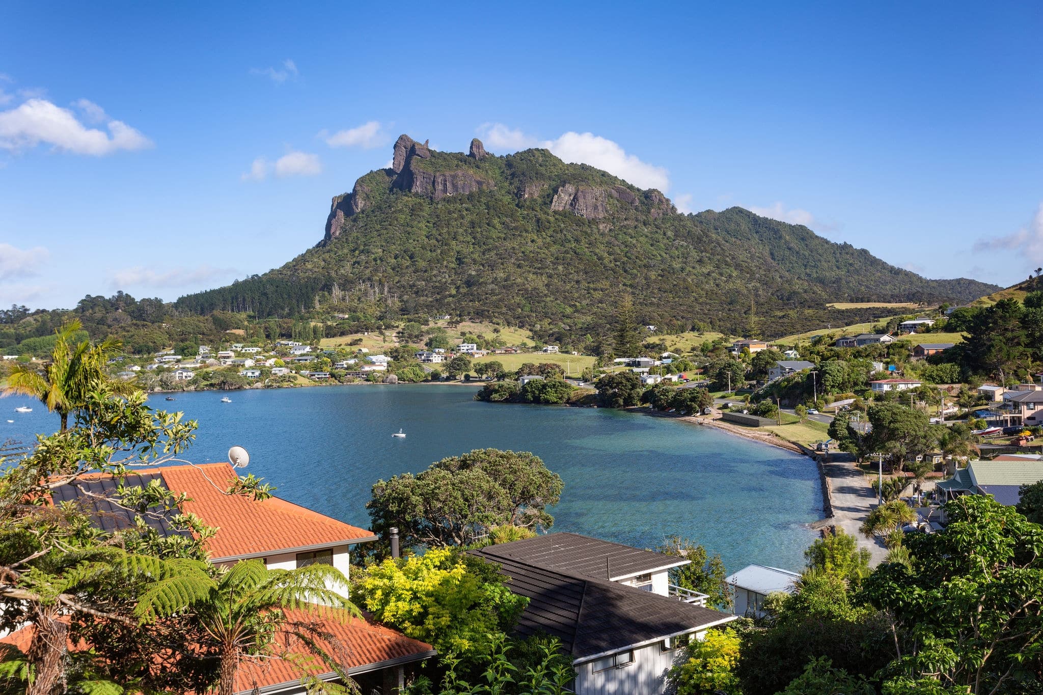 Mount Manaia rises above beautiful bay, Whangarei Heads, Northland, New Zealand