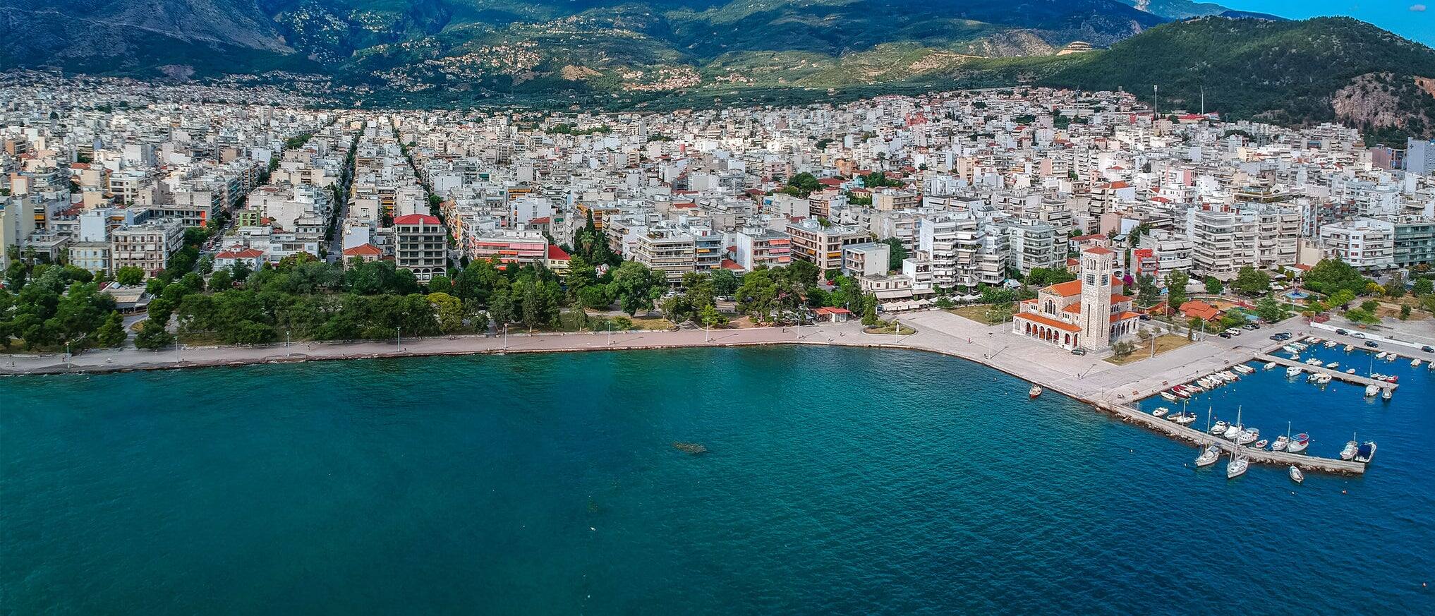 Aerial photo over Volos city and the port in Magnesia, Greece