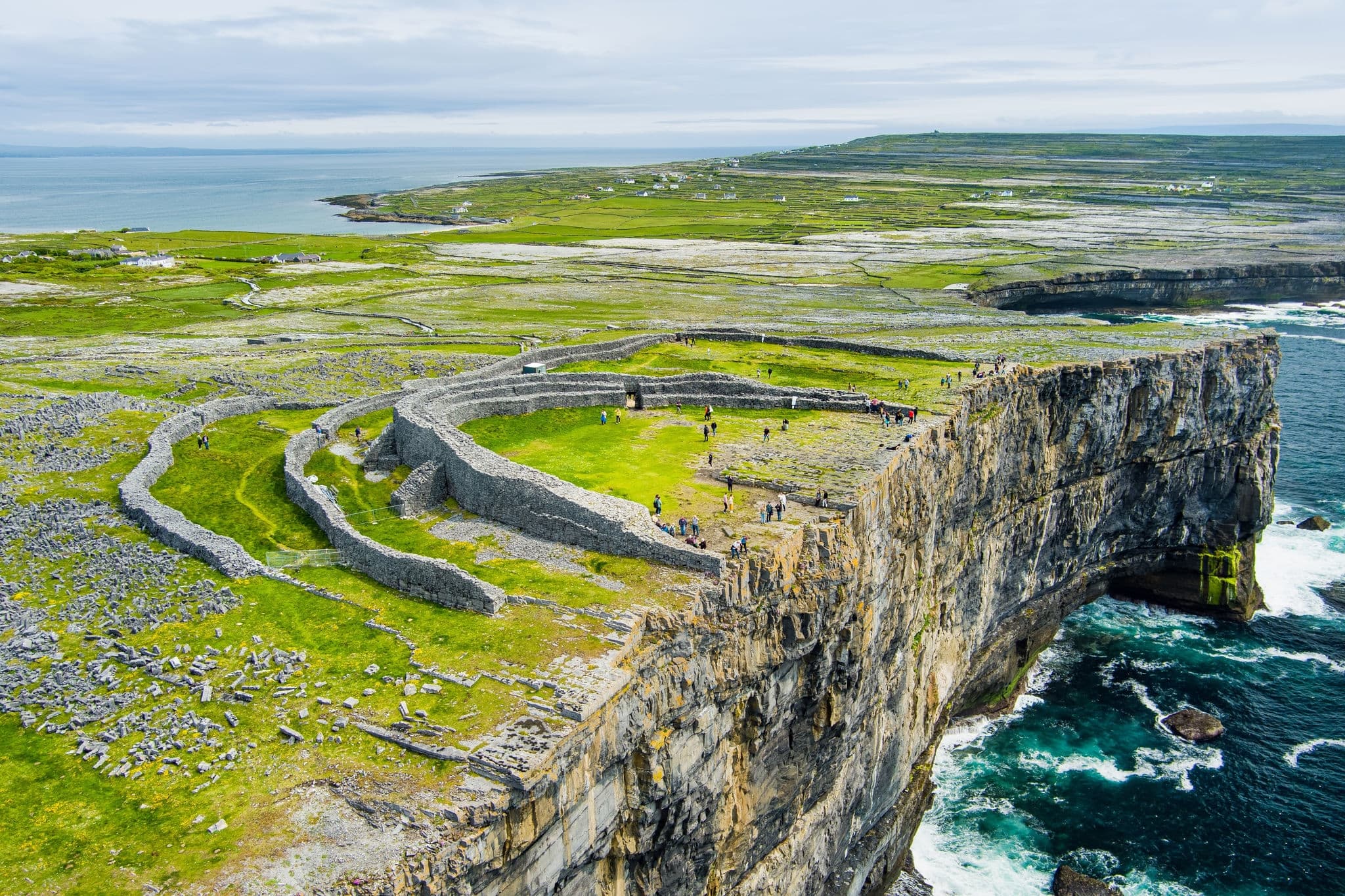 Aerial view of Dun Aonghasa or Dun Aengus , the largest prehistoric stone fort of the Aran Islands, popular tourist attraction, important archaeological site, Inishmore island, Ireland