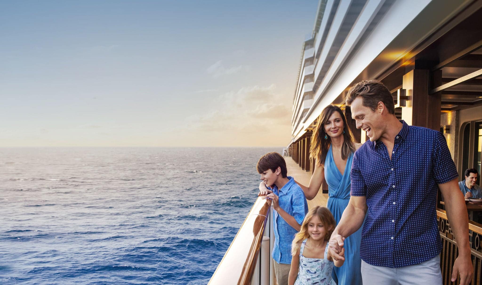 Family of four on cruise ship deck