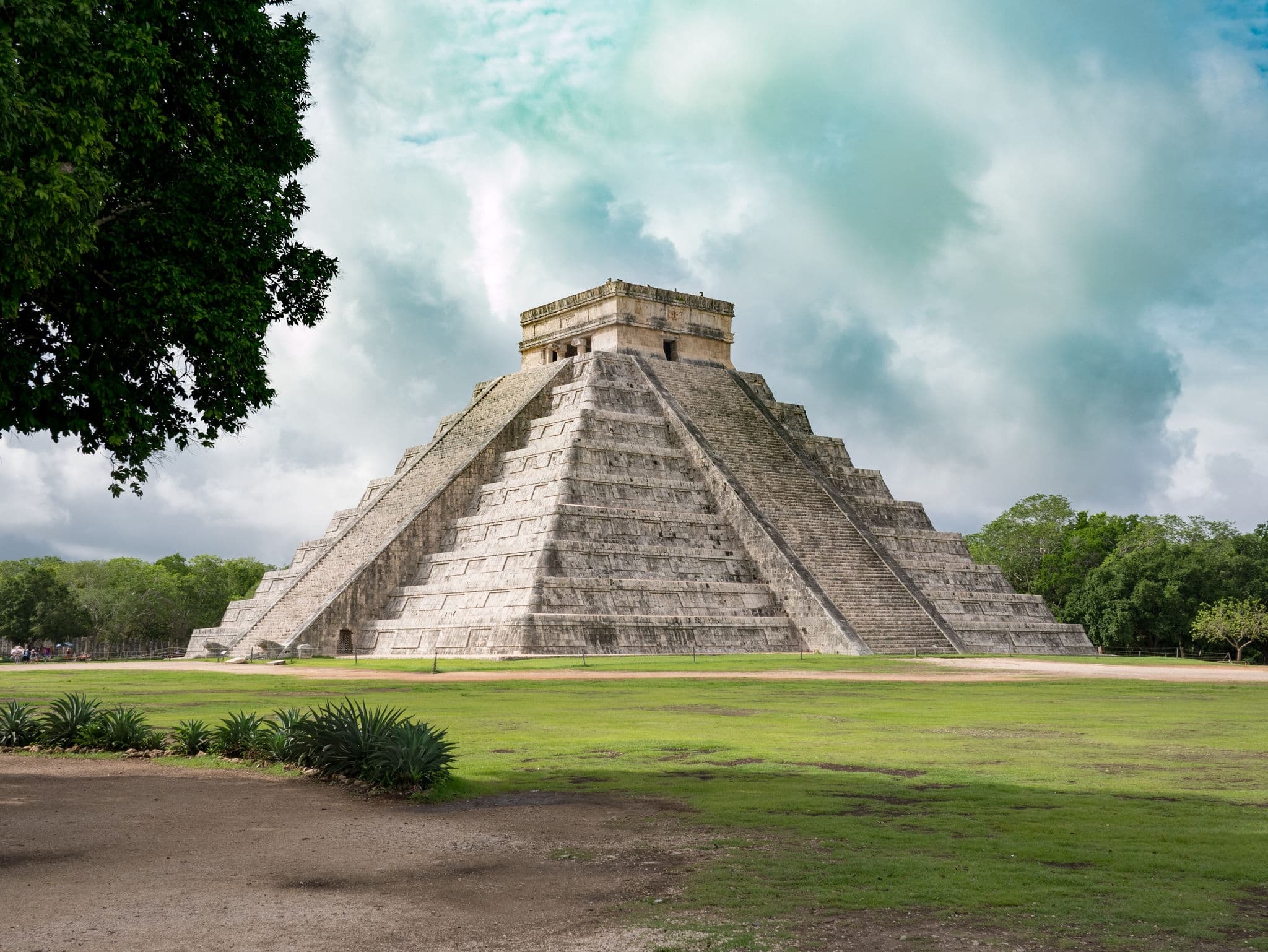 The internationally famomus landmark chichen itza, a historic maya temple in Yucatan, Mexico, shot during cloudy day