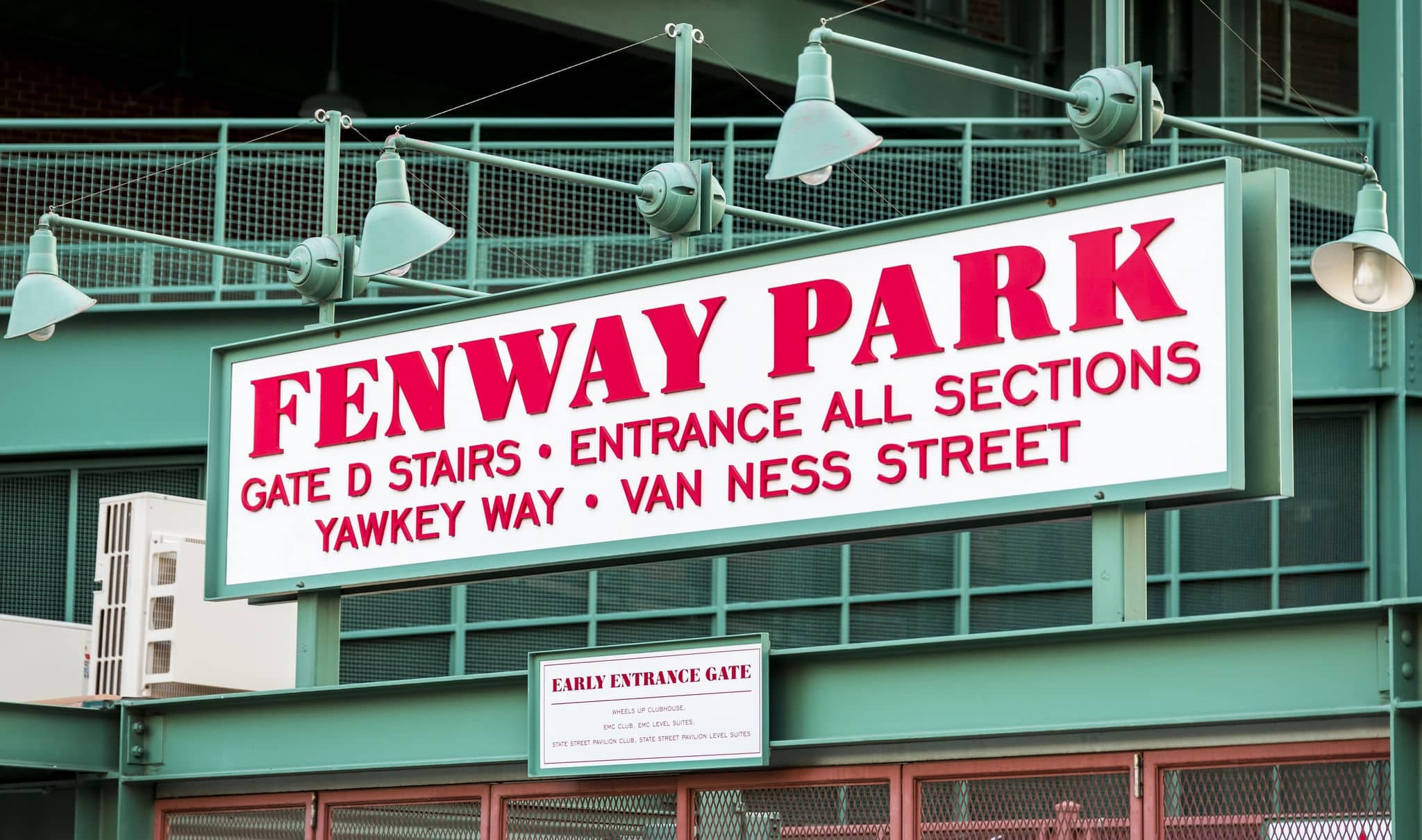 BOSTON, USA - AUGUST 5: The architecture of the historic Fenway Park Stadium in Boston, MA, USA showcasing one of its signs at the ticket booths on August 5, 2016.
