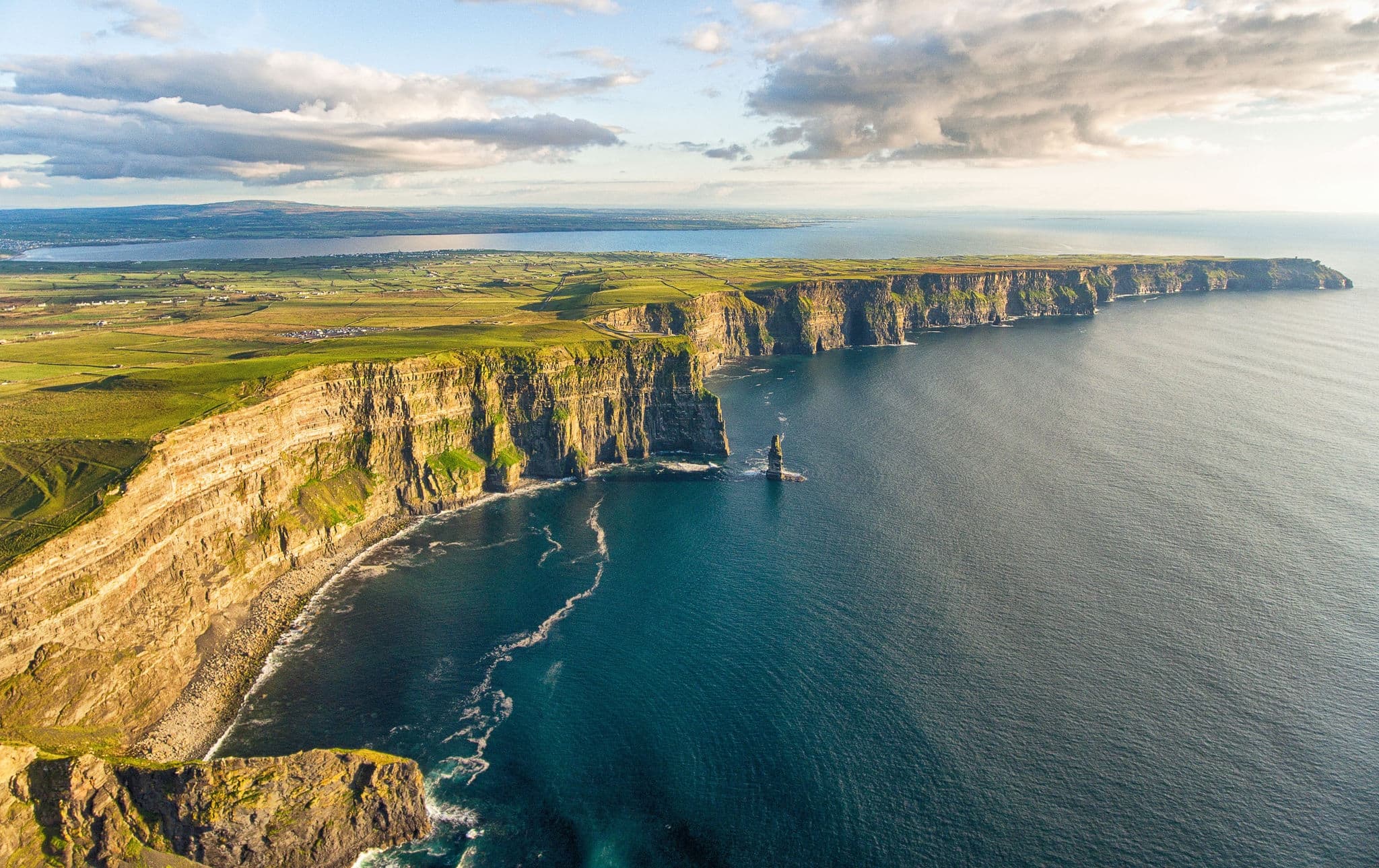 Aerial birds eye drone view from the world famous cliffs of moher in county clare ireland. Scenic Irish rural countryside nature along the wild atlantic way and European Atlantic Geotourism Route 