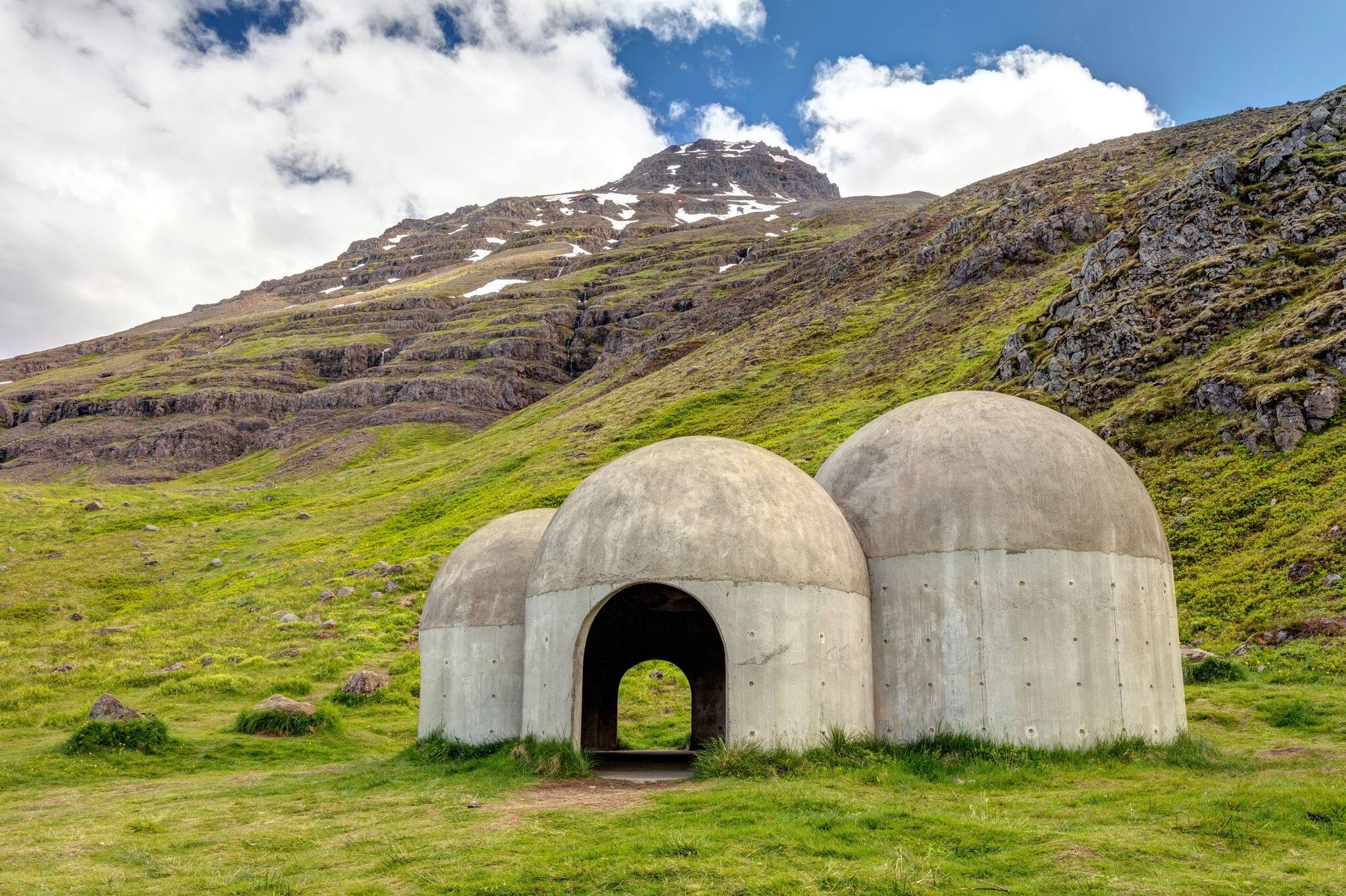 Tvisongur Sound Sculpture of Seydisfjordur, Iceland. It consist of 5 concrete dome. Each dome has its own resonance that corresponds to a tone in the Icelandic musical tradition of five-tone harmony