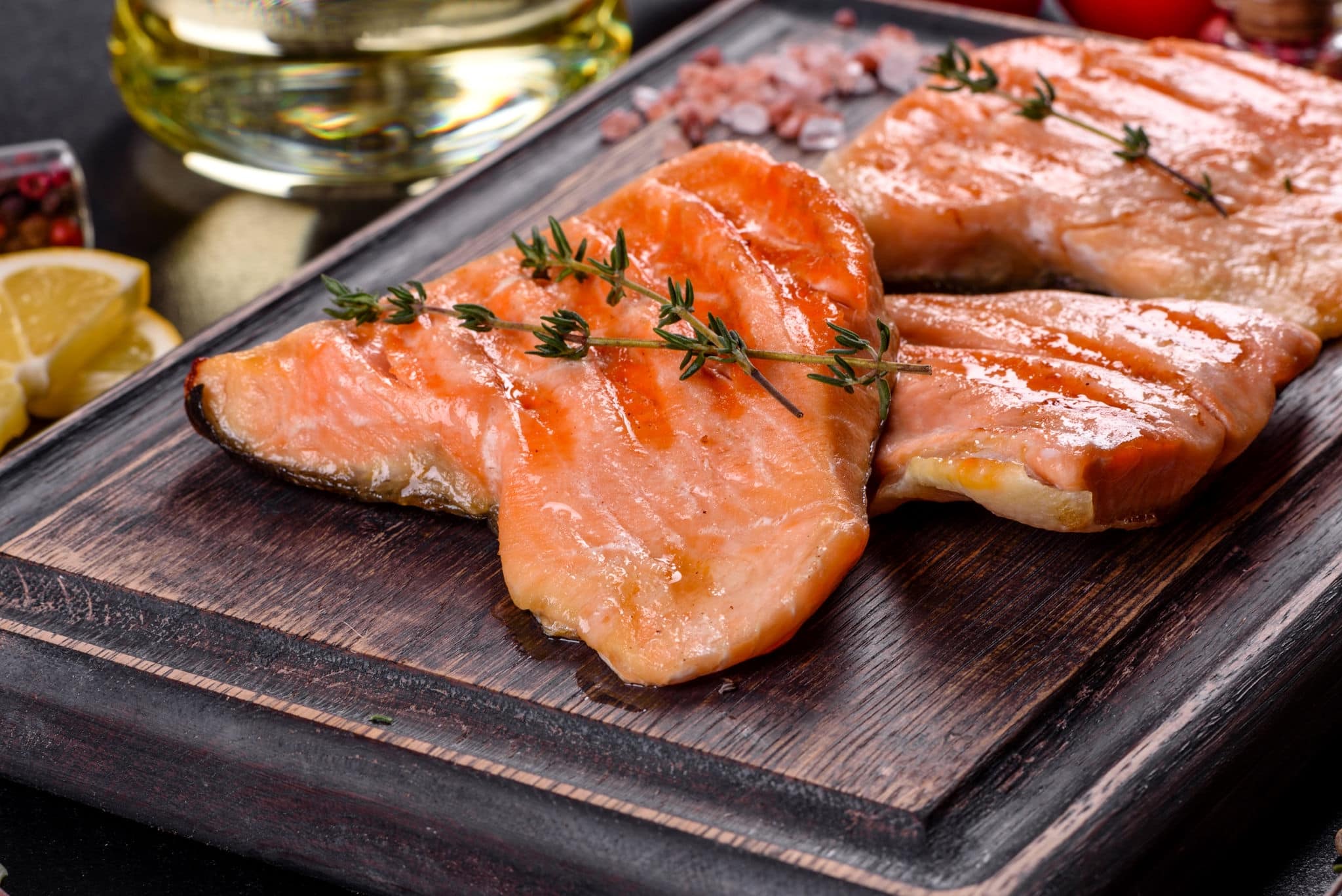 Tasty fresh red fish arctic char baked on a grill. Source of omega, healthy food