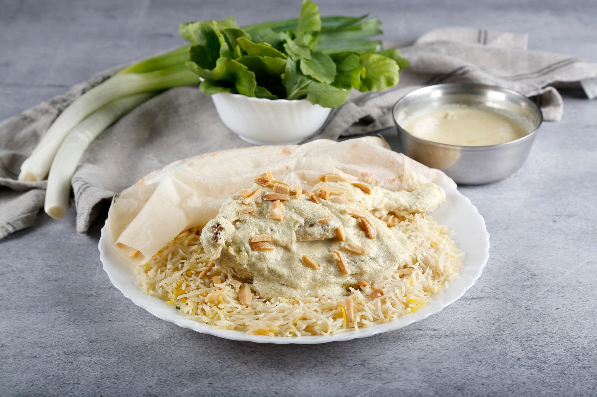 Jordanian meal, Mansaf. rice with yogurt Mansaf with meat and jameed, jamed and nuts on top