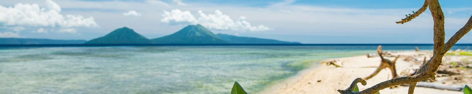 View Rabaul beach and volcano in Papua New Guinea