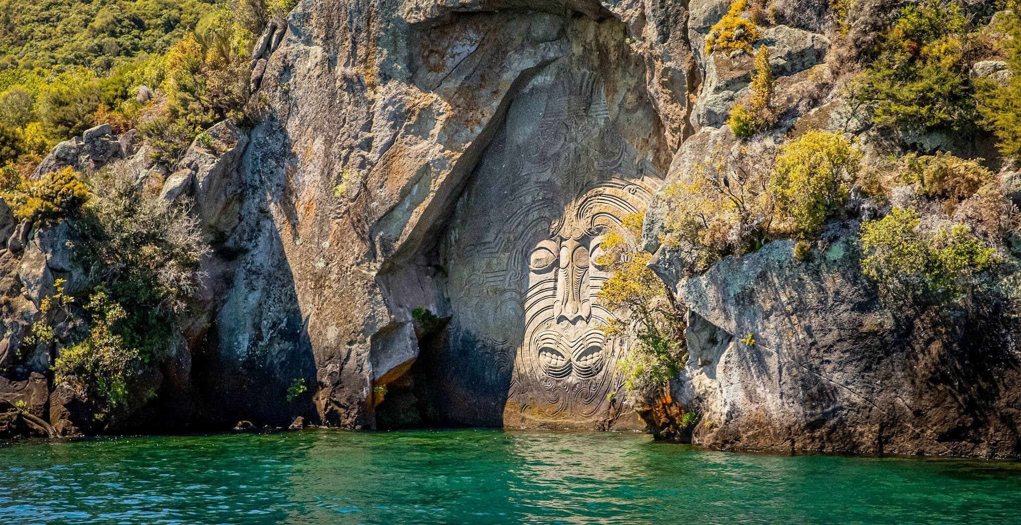 traditional rock carving lake taupo north island new zealand. High quality photo