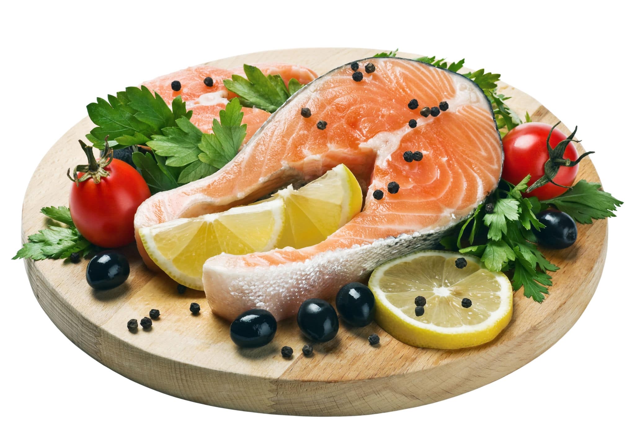 freshly caught salmon steaks with vegetables and spices for cooking on the grill. Can be used in cooking advertising in magazines and on the Internet for recipes.