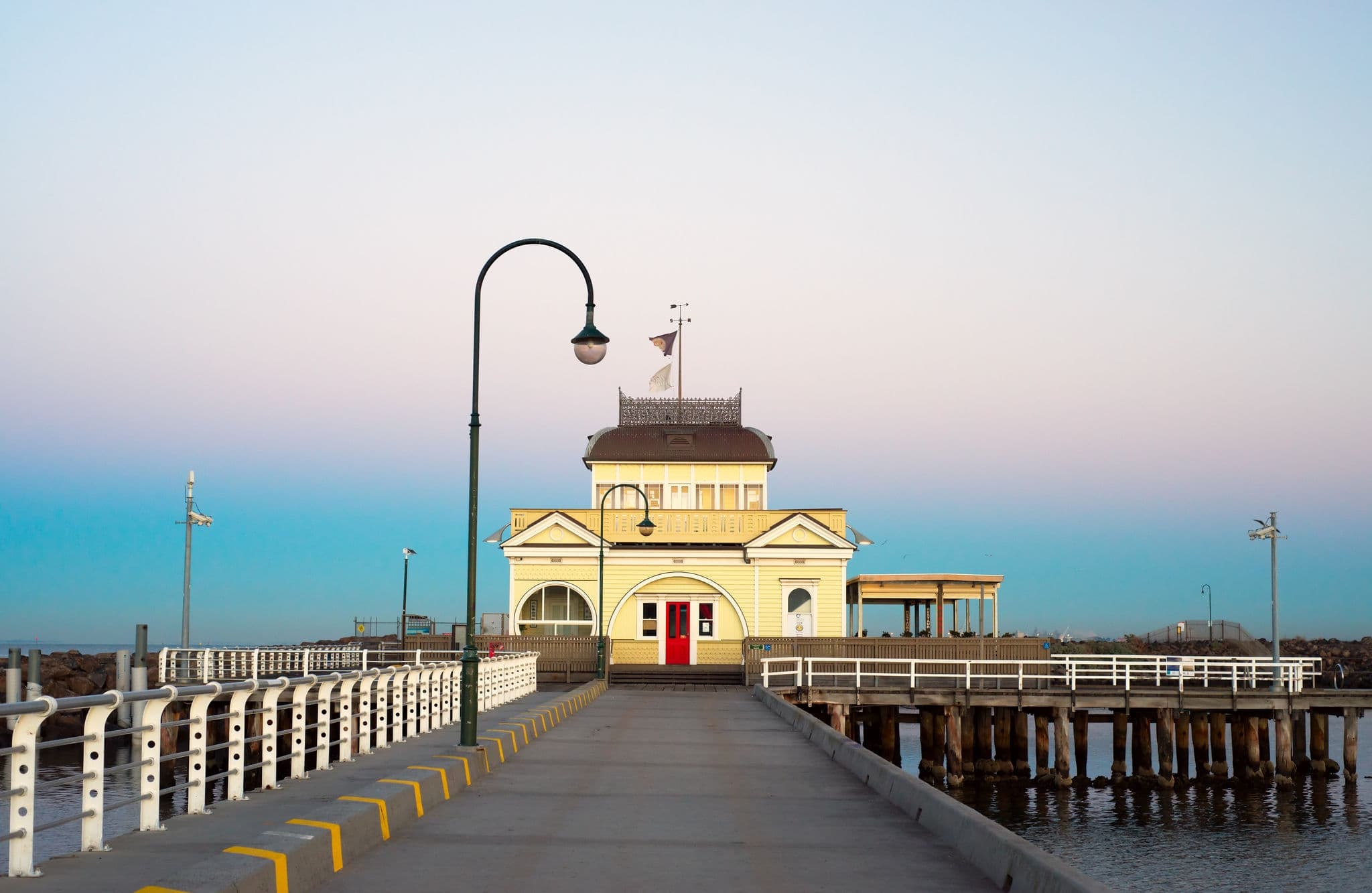 A sunrise photo of a Kiosk on St Kilda Pier in Melbourne, Australia.