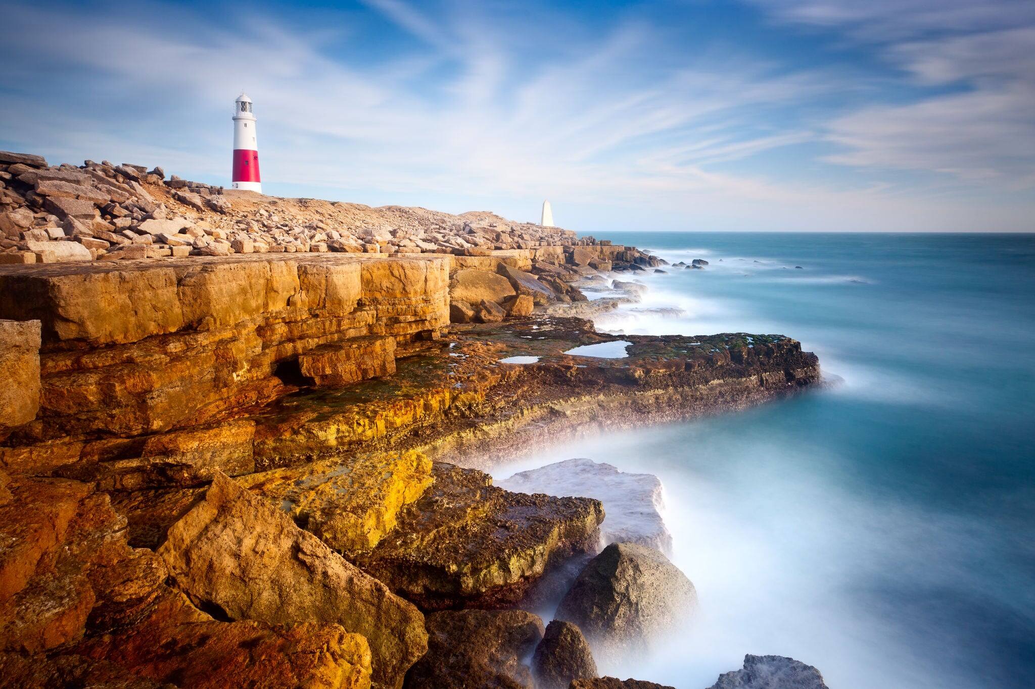 Waves crashing on the cliffs at Portland Bill on the Isle of Portland Dorset England