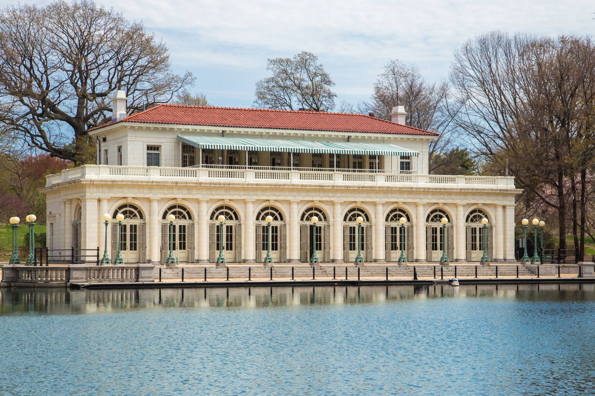 Historic lakeside boathouse and lake at Prospect Park, Brooklyn New York