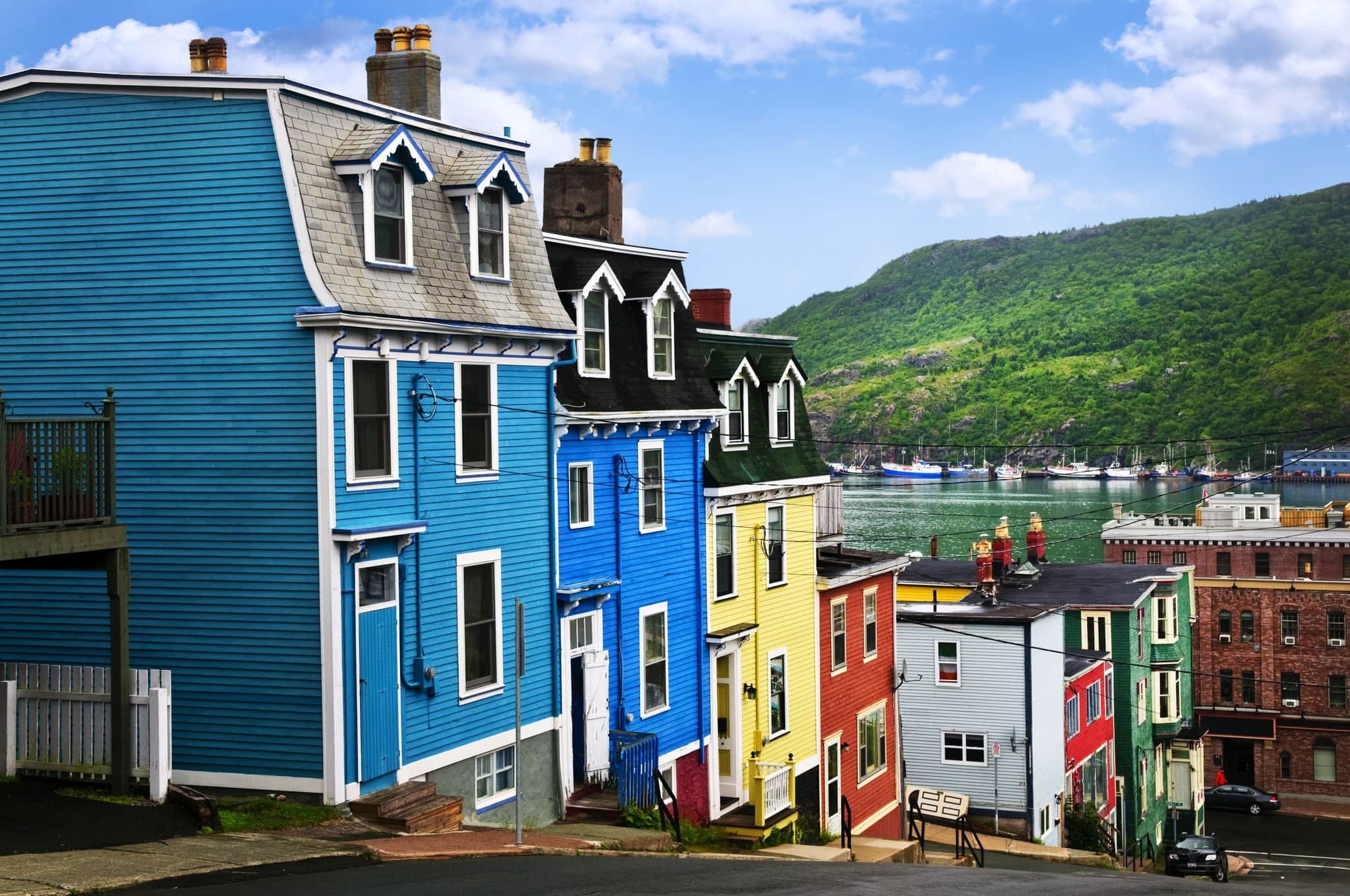 Street with colorful houses near ocean in St. John's, Newfoundland, Canada