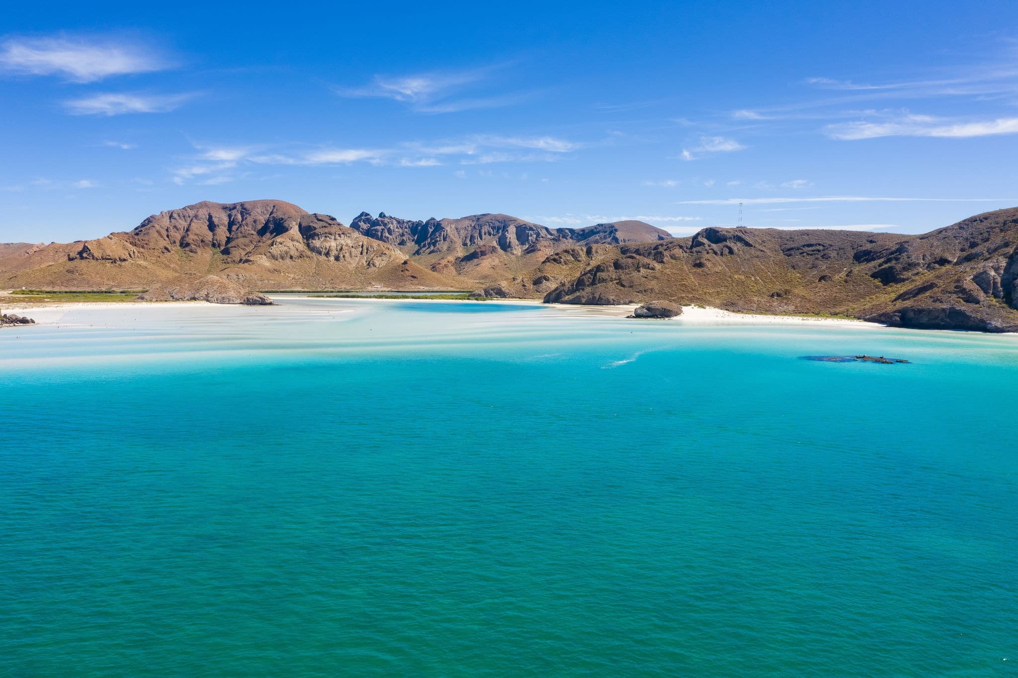 Mexican paradise beach Playa Balandra ner La Paz with white sand and blue water. popular tourist destination. Aerial panoramic view from above 