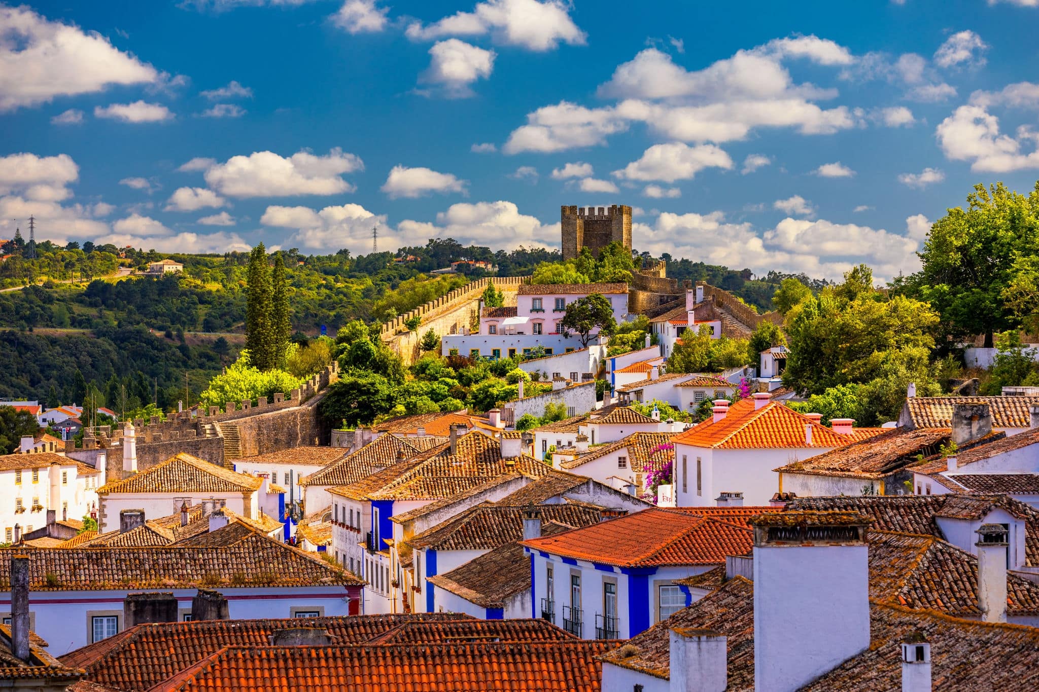 Obidos, Portugal stonewalled city with medieval fortress, historic walled town of Obidos, near Lisbon, Portugal. Beautiful view of Obidos Medieval Town, Portugal. 