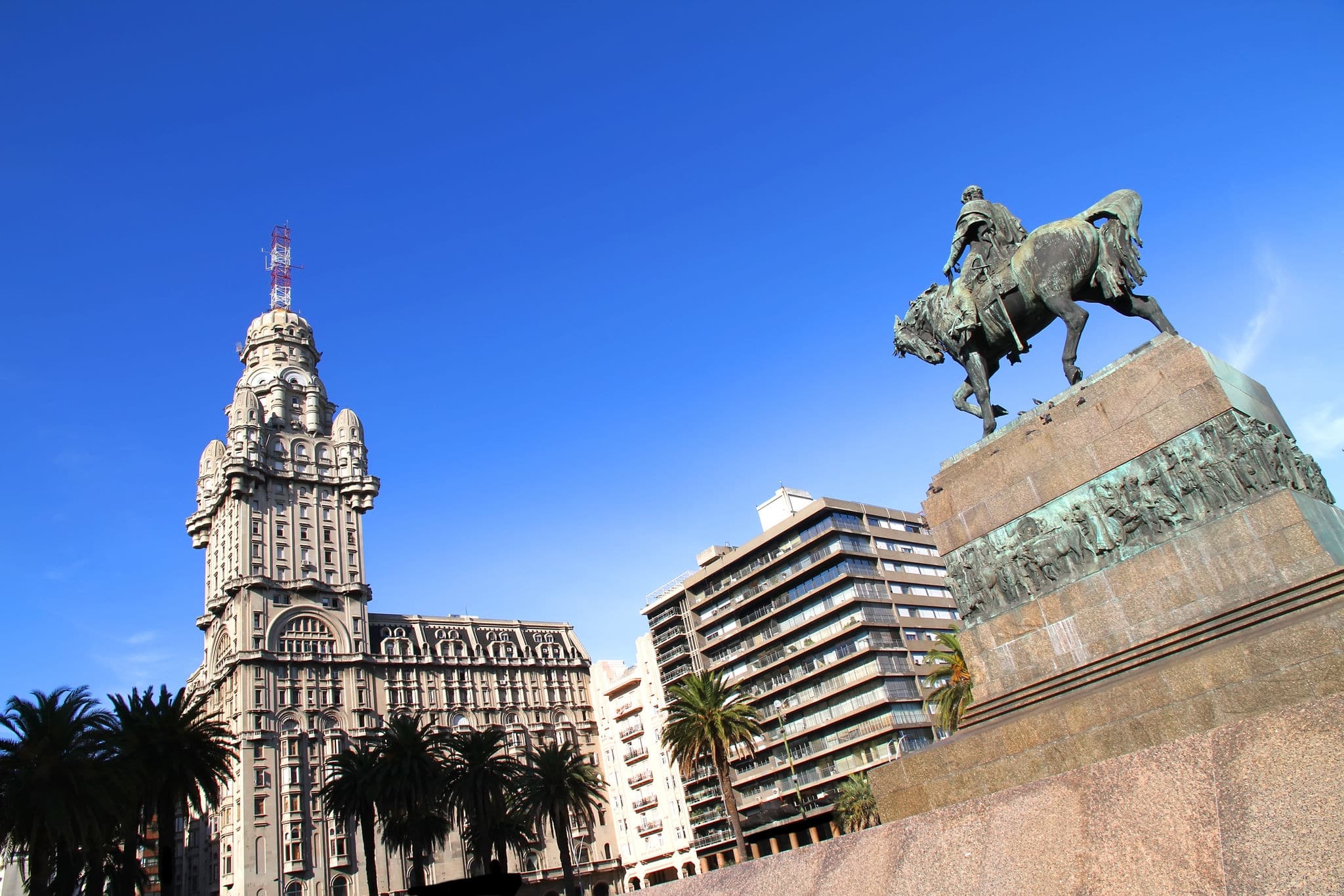 The Plaza independencia in Montevideo, Uruguay. The Palacio Salvo in the Background and the Monument of the grave of General Artigas in the Foreground.