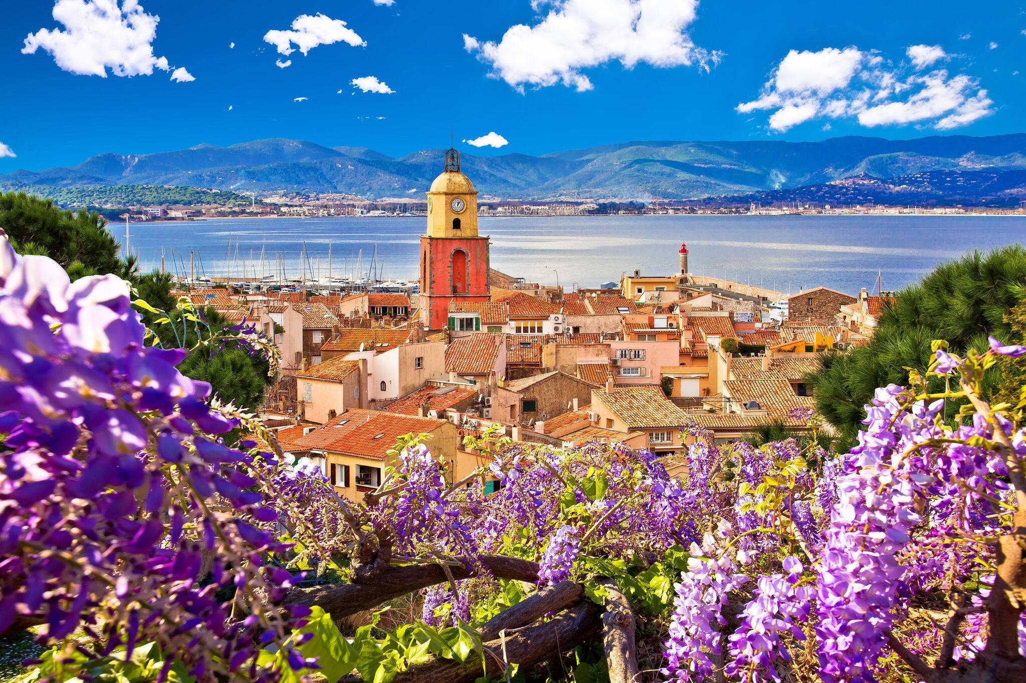 Saint Tropez village church tower and old rooftops view, famous tourist destination on Cote d Azur, Alpes-Maritimes department in southern France