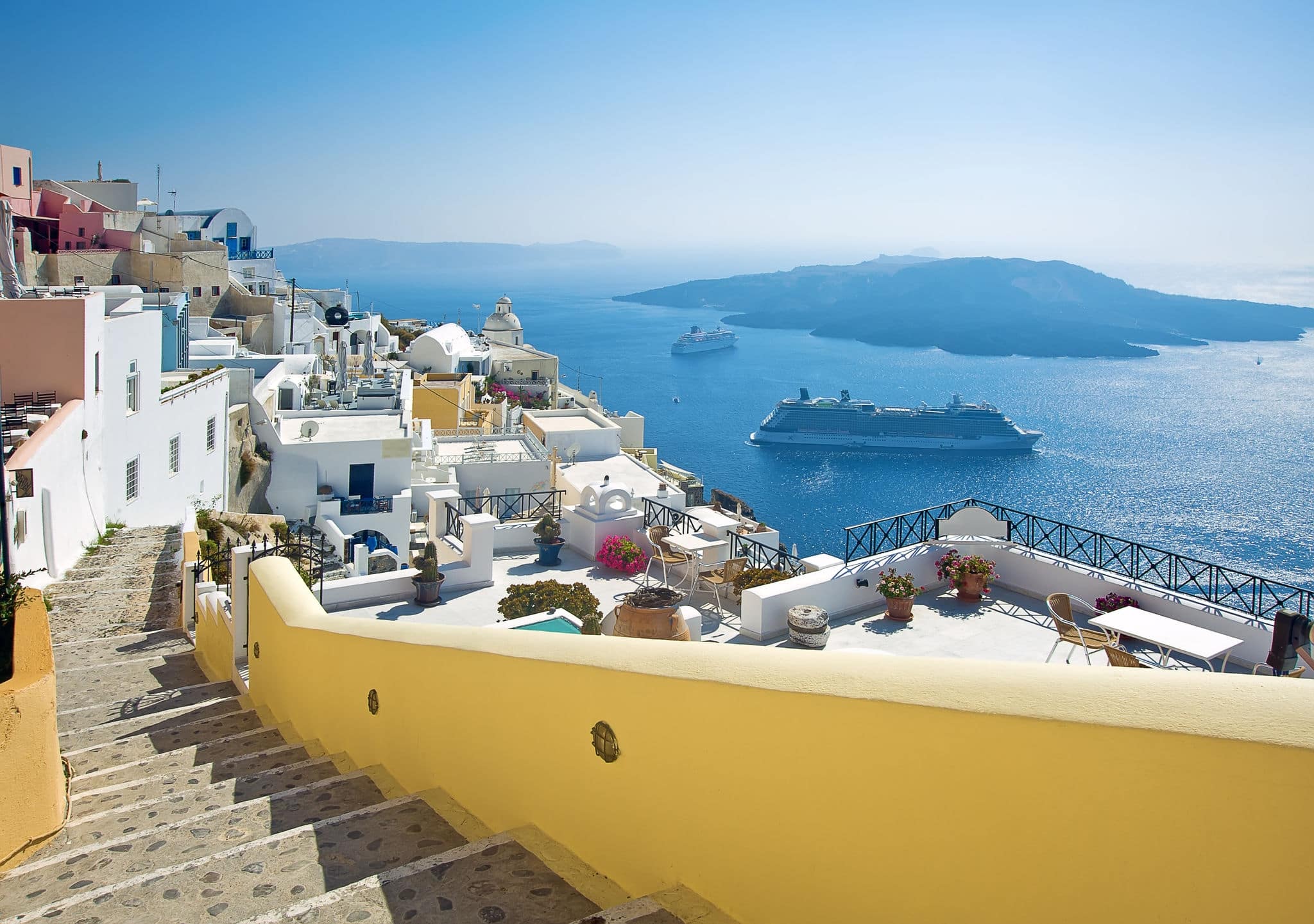 Fira panorama with caldera view and Nea Kameni, Santorini, Greece