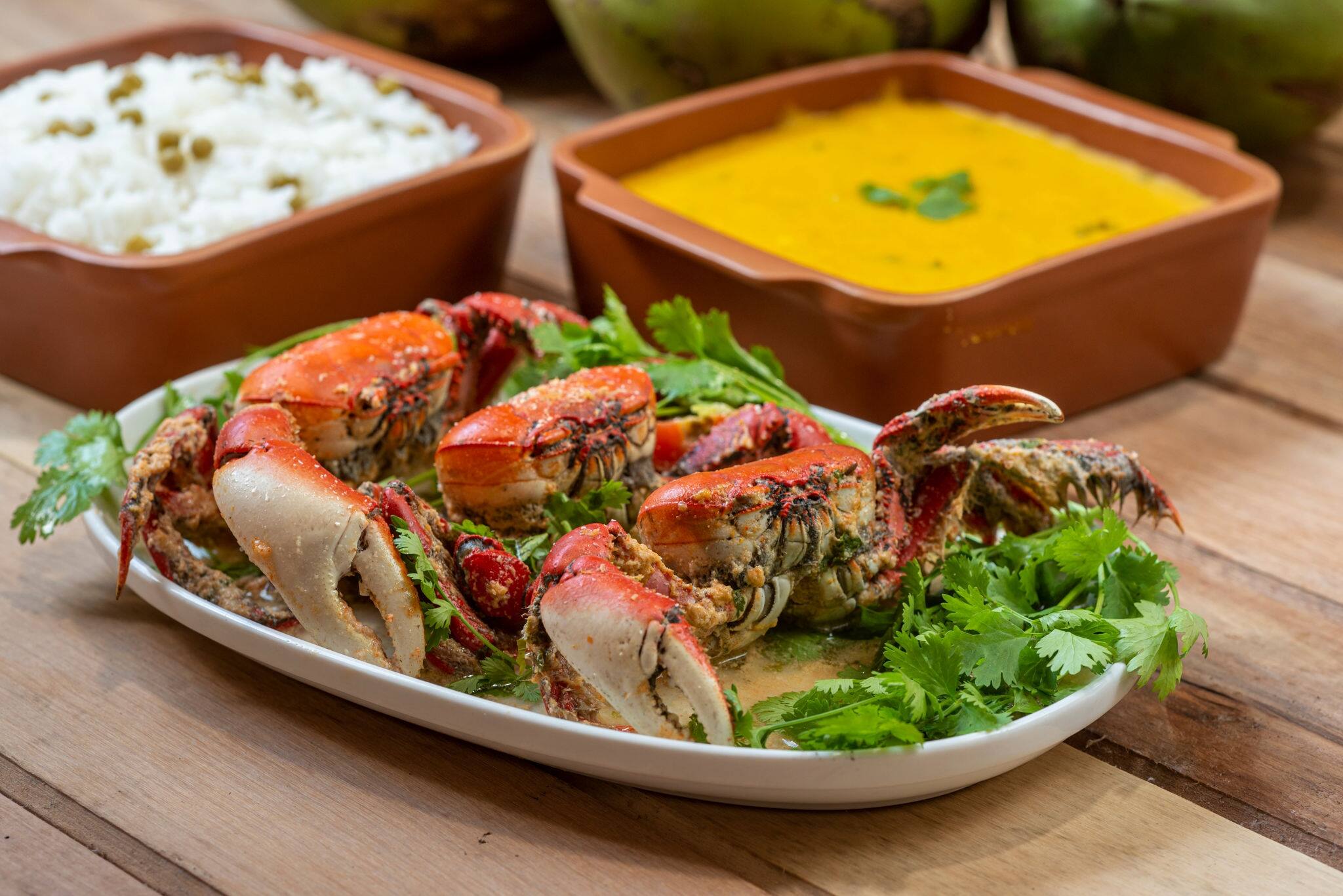 Crab in coconut sauce. Typical delicacy served in restaurants and tents on the beaches of northeastern Brazil.