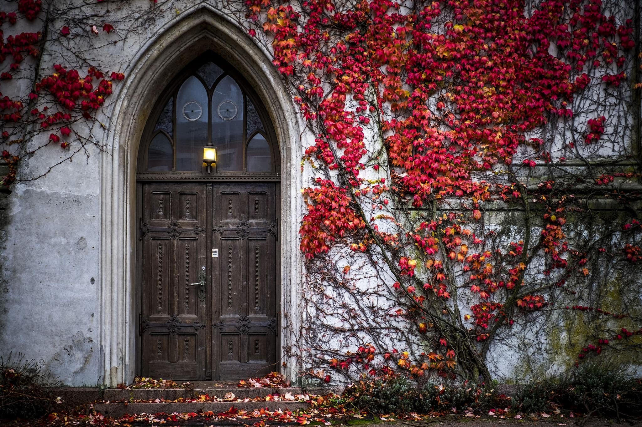 Church door in Kristiansand covered in autumn colours.