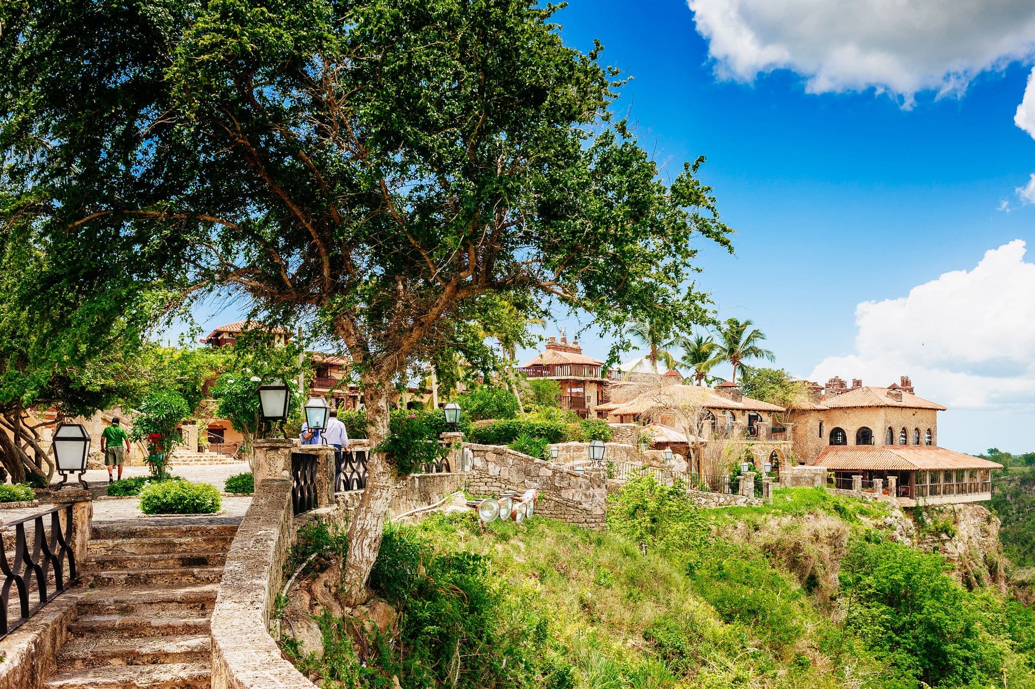 Ancient Italian-style village Altos de Chavon - Colonial town reconstructed in Casa de Campo, La Romana, Dominican Republic. Tropical river Chavon in Dominican Republic. Vacation and travel.