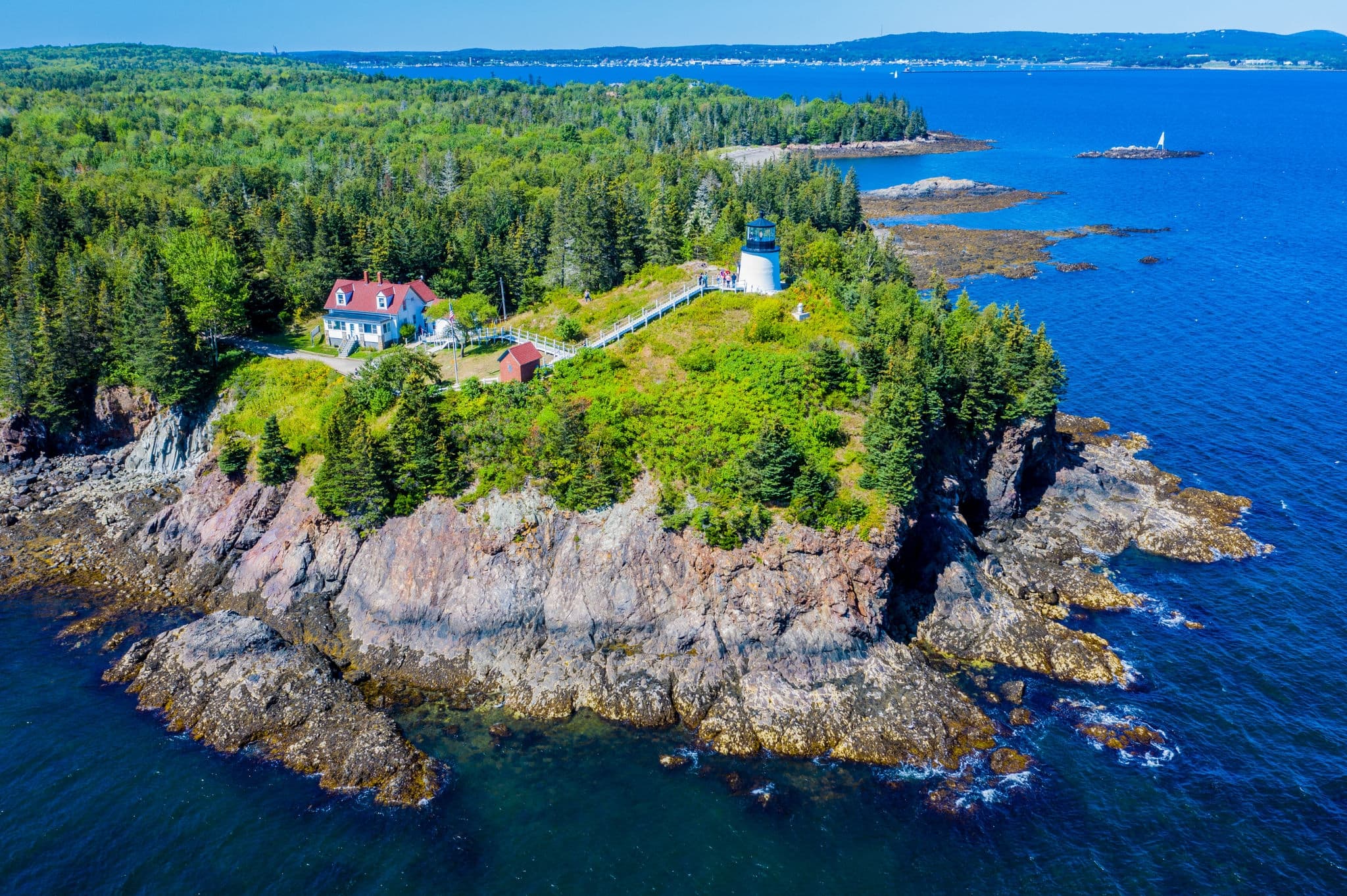 Aerial view of Owls Head Light located at the entrance of Rockland Harbor on western Penobscot Bay in the town of Owls Head, Knox County, Maine