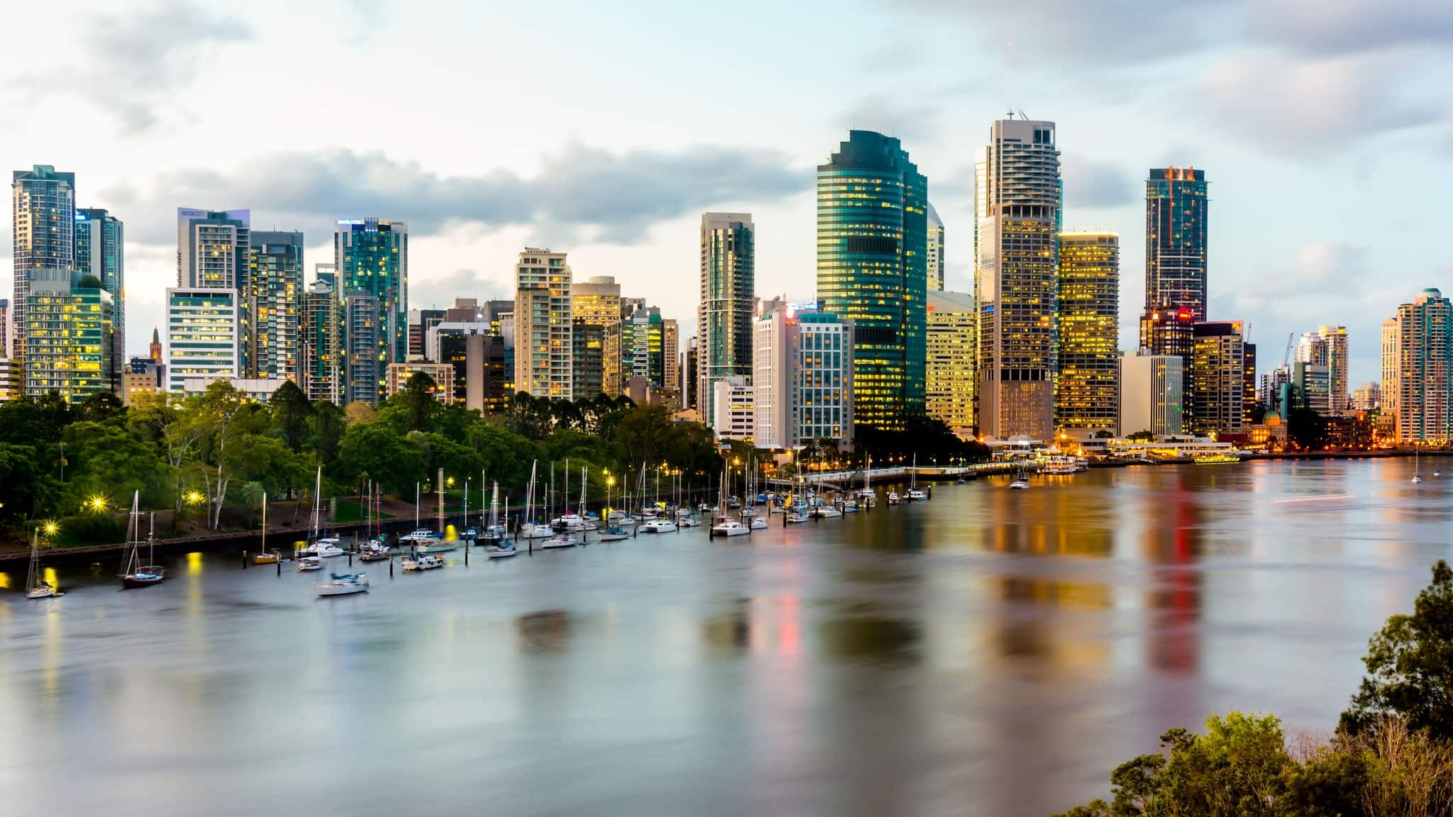 Scenic view of Brisbane River and Cityscape from Kangaroo Point Cliffs late afternoon. HDR image.