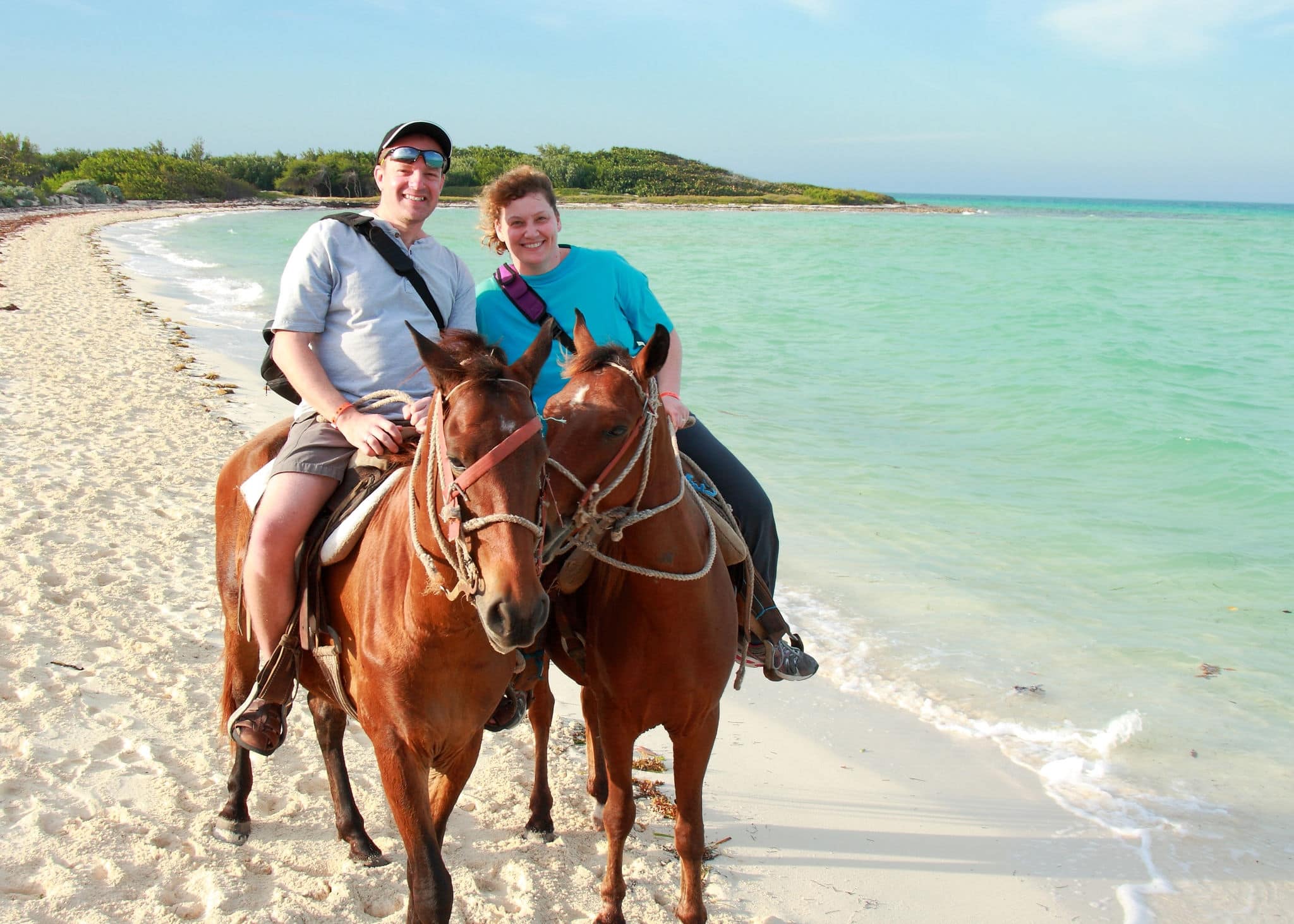 romantic horseback riding on ocean beach