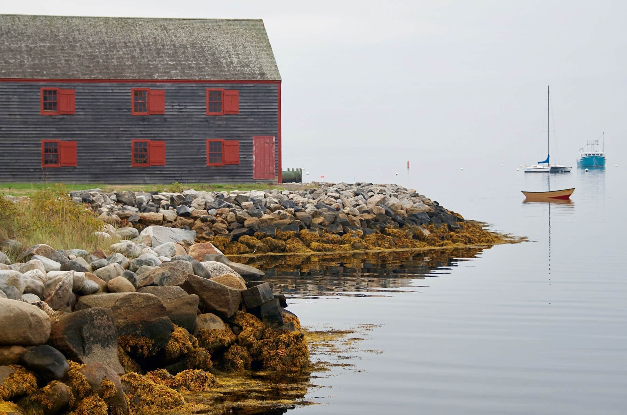 Nova Scotia Shelburne Village Seaside Wooden Warehouse and Sailboat on Foggy Day