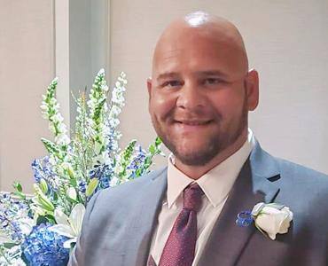 Larry Knight Jr., ganador del premio Giving Joy de Norwegian-