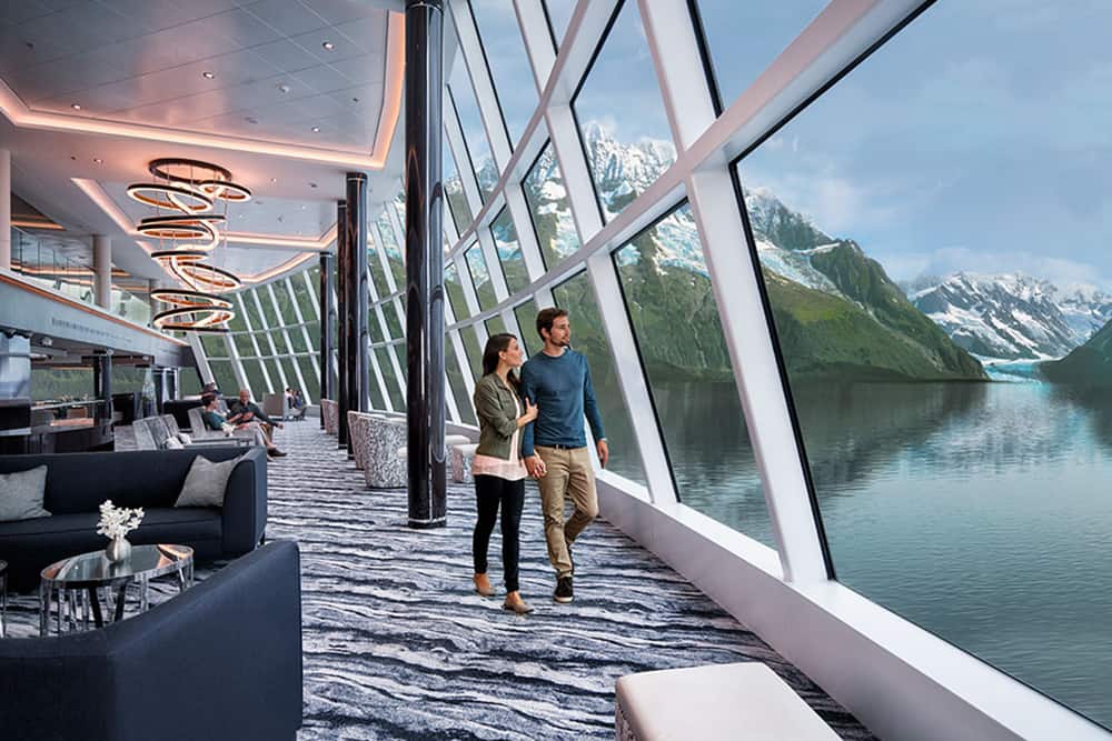 Couple on Norwegian Bliss observing the scenery