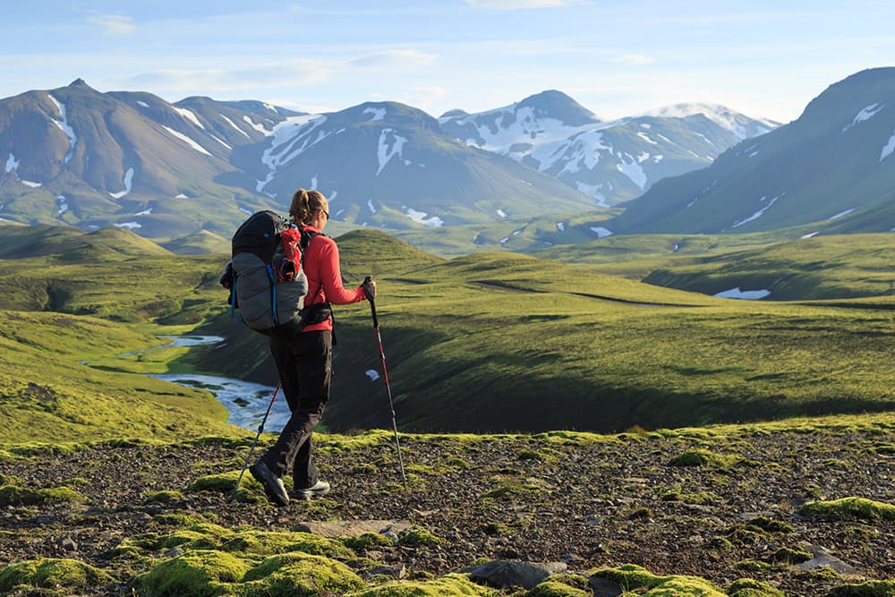 Woman on a hike enjoying the Icelandic landscape