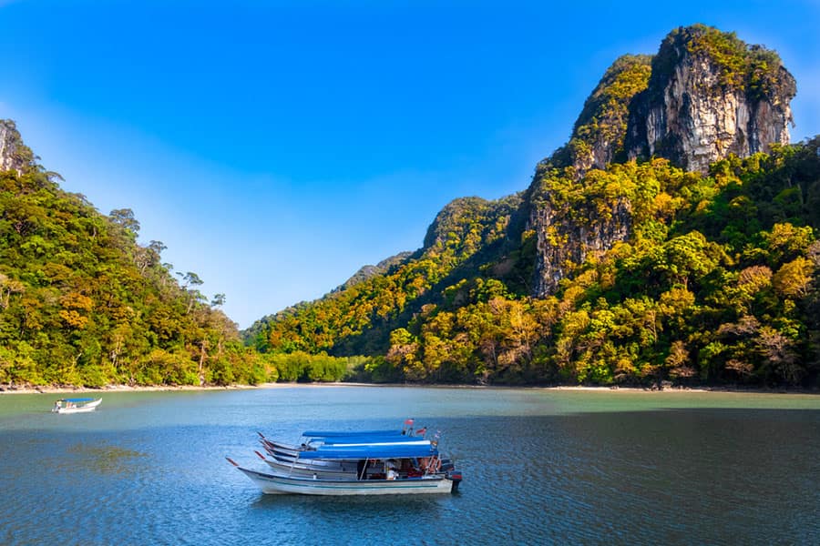 See a Traditional Fishing Boat in Langkawi, Malaysia on your Indian Ocean Cruise with Norwegian