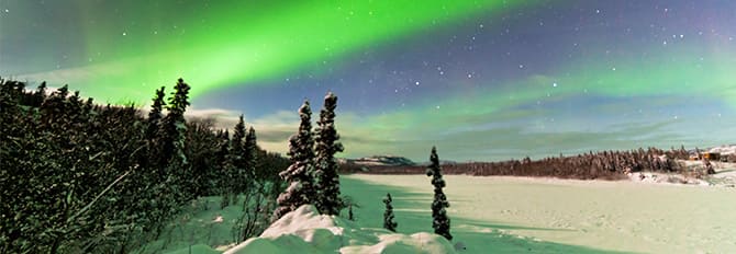 Witness the breathtaking view of the Northern Lights over Alaska