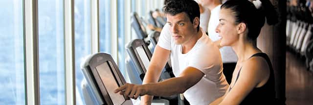 Stay in shape while cruising by taking advantage of gym facilities and fitness classes