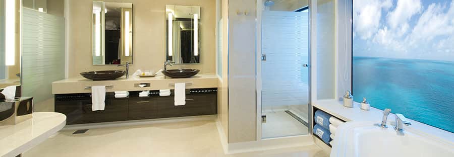 The Haven's Deluxe Owners Suite with Large Balcony Bathroom on Norwegian Getaway