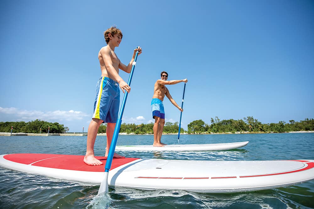 Paddle boarding at Harvest Caye