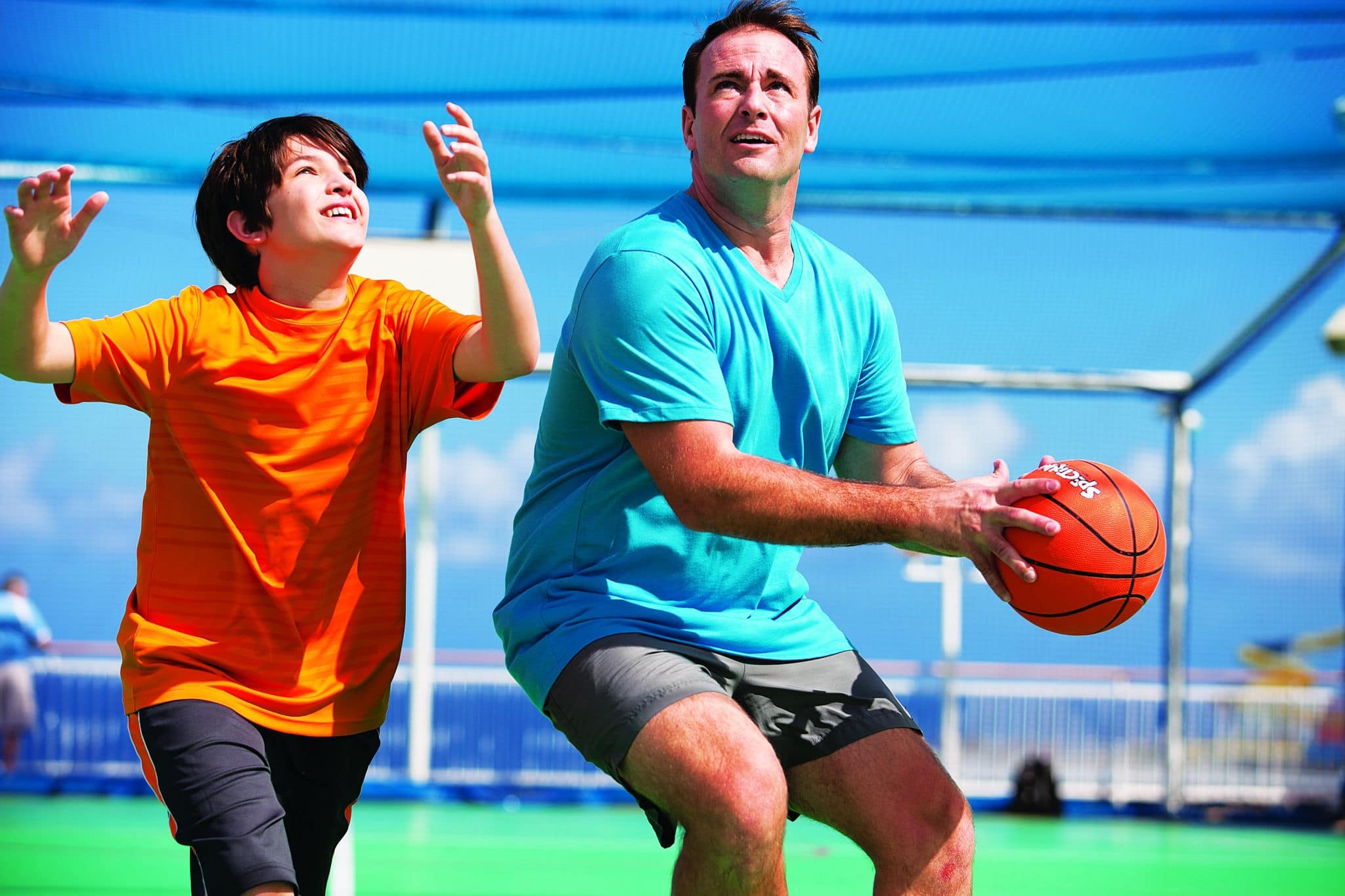 NCL-Cruise-Lifestyle-Father-Son-Basketball-Blog Dad shooting basketball