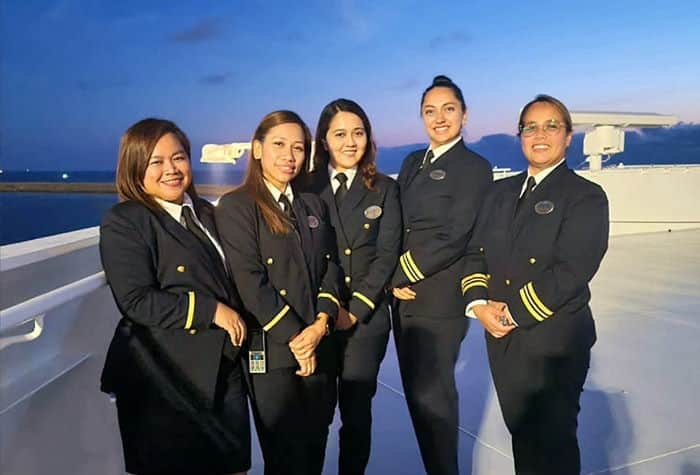 Crew members aboard the ship. Crew members aboard the ship.